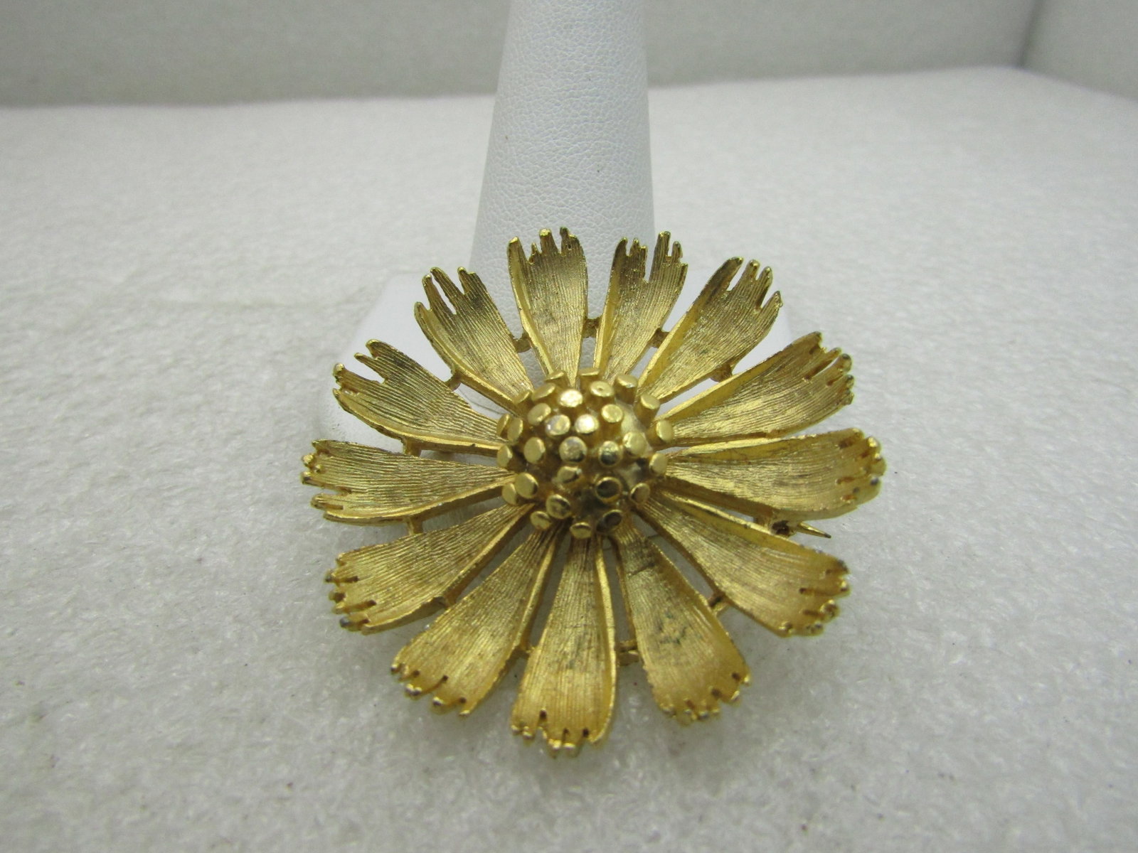 Vintage BSK Floral Blossom Brooch, 1.75", 1960's: Vintage BSK Floral Blossom Brooch, 1.75", 1960's, Daily like, gold tone, with raised center and both textured and shiny finish. Petals curve upward. Signed BSK. Very good condition. (INV. W.3720.5 SS1