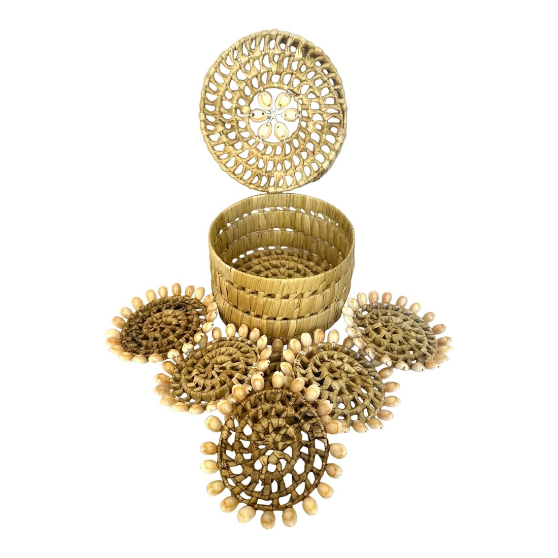 Woven Banana Leaf & Seashell Coaster -A Set: Vintage handmade Cowrie Shell Woven Banana Leaf/Rafia set of 6 Coasters plus container. Perfect for a coastal beach house. 3.5in h x 5.5in w 3.75in round coaster Make sure to follow me, I have flash s