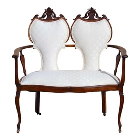 Late 19th Century Antique Victorian Loveseat With Casters, Cream Upholstery and Wood Frame