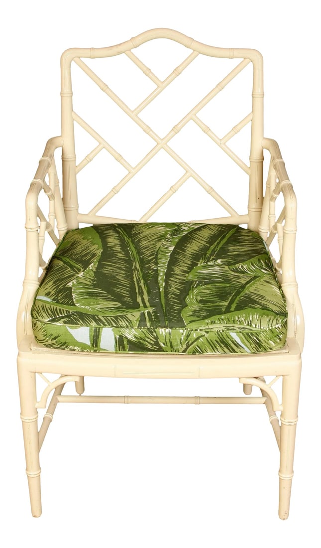 Set of Four White Vintage Bamboo Chairs with Meg Braff Fabric Cushion: This set of four white vintage bamboo chairs showcases a classic, airy design with a timeless appeal. The chairs are crafted from painted bamboo, featuring intricate lattice-style backs and gently cur