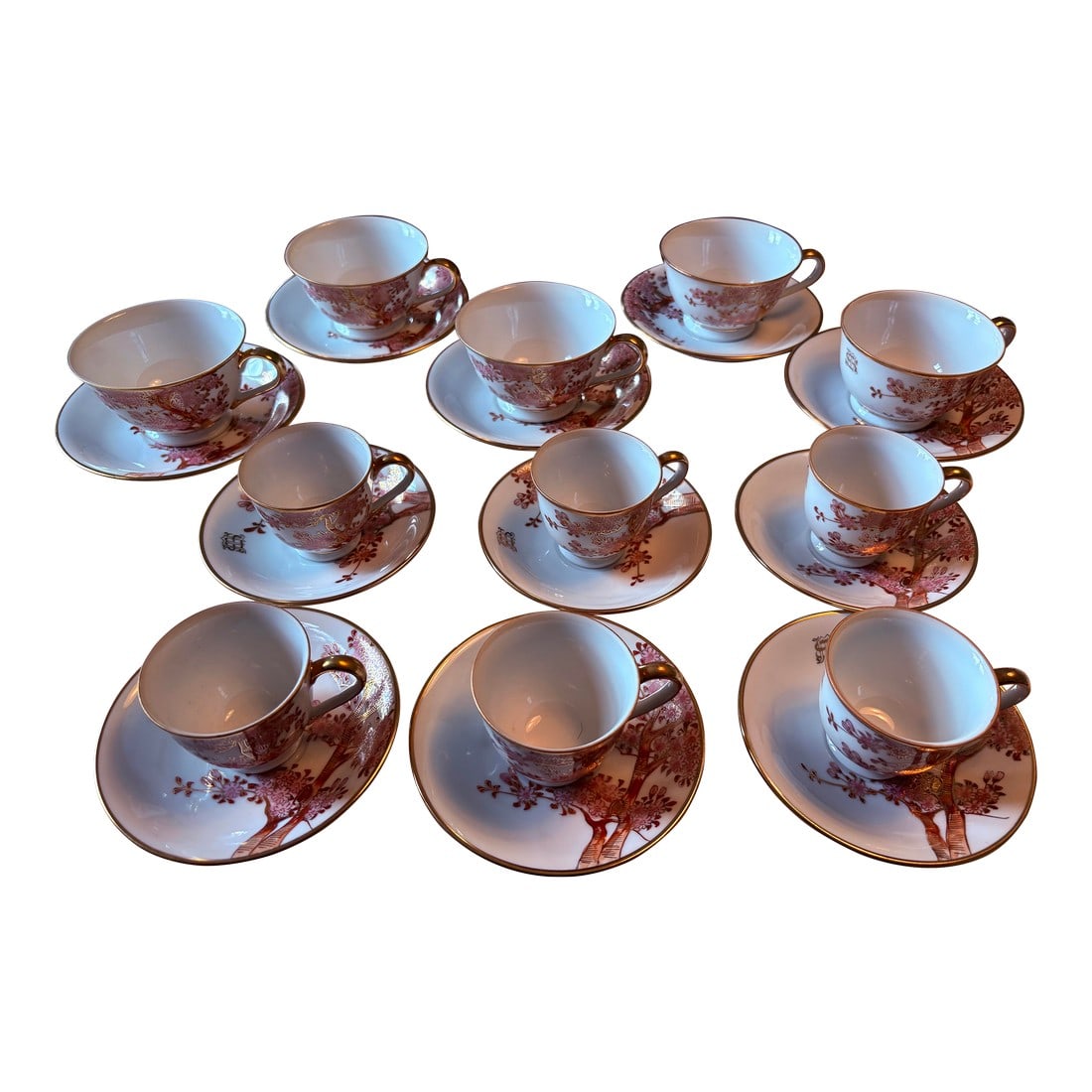Vintage Tea and Espresso Cup Set Featuring Handpainted and Gilted Cherry Blossoms - 22 Piece Set: Stunning set of tea cups and saucers (5) and espresso cups and saucers (6) featuring hand painted and Gilted cherry blossoms. By Soko China. Condition: Alterations: Original Condition Unaltered Imperf