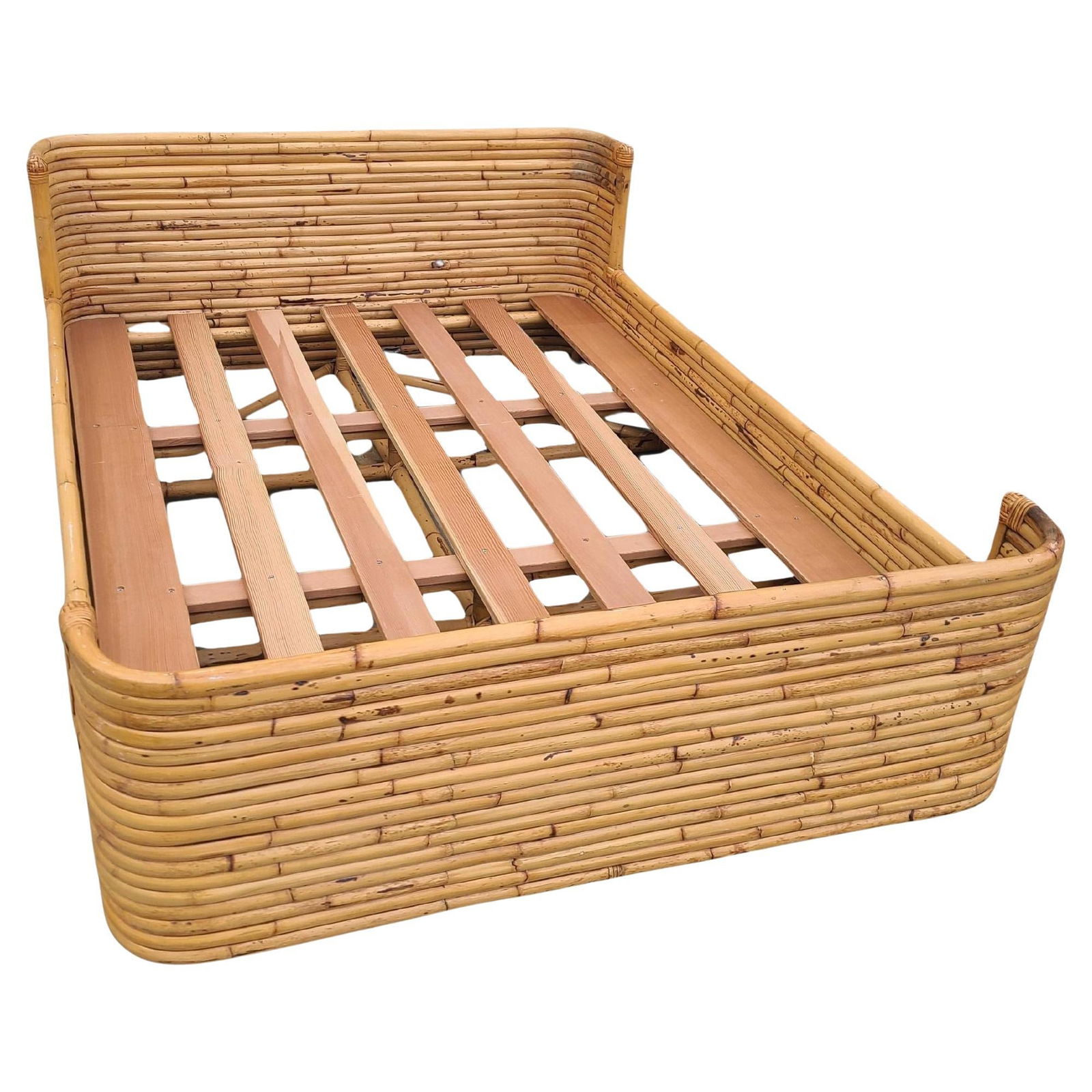 Vintage Full Size Stacked Rattan Bed-Frame by Seven Seas: Title:Vintage Full Size Stacked Rattan Bed-Frame by Seven Seas Description:This full-sized bed frame was built by Seven Seas Rattan Company (1938 to 2011) in the 1950s. It features a stacked rattan ba