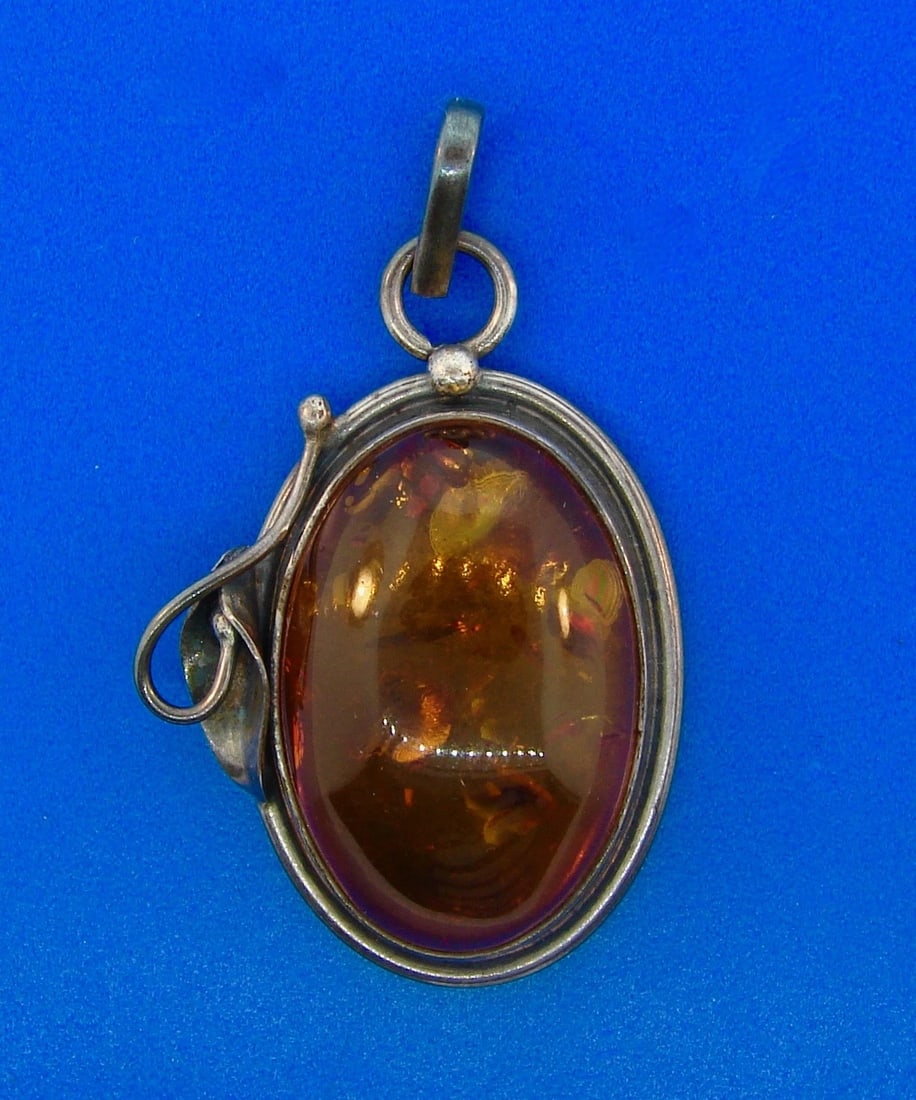 Amber Oxidized Sterling Silver Oval Pendant: Title: Amber Oxidized Sterling Silver Oval Pendant Description: American Estate Fine Jewelry, Arts & Antiques Purveyors and Purchasers of Antique and Estate Pieces 191 South Beverly Drive Beverly Hill
