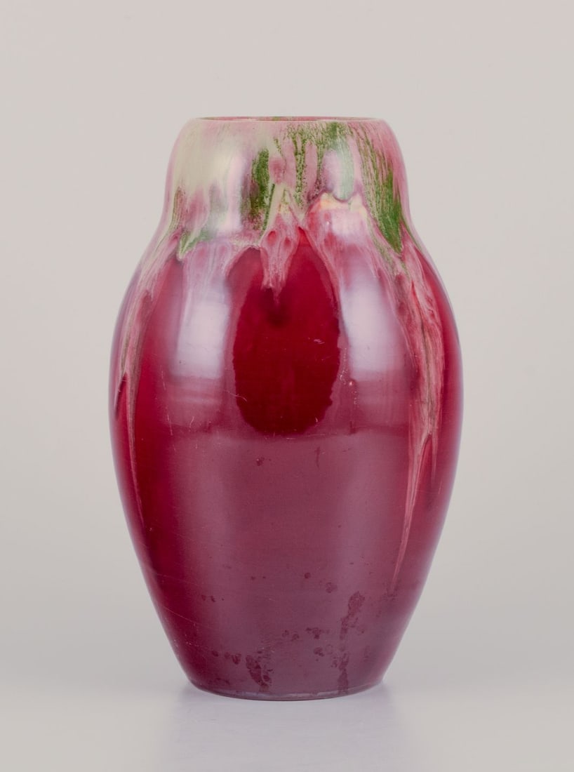 Michael Andersen, Bornholm. Large ceramic vase with float glaze in violet and green shades. Mid 20th: Michael Andersen, Bornholm. Large vase in ceramic. Float glaze in violet and green shades. Model 1409. Mid 20th century. Marked. Perfect condition. Dimensions: Height 26.0 cm. x Diameter 15.0 cm. Rese