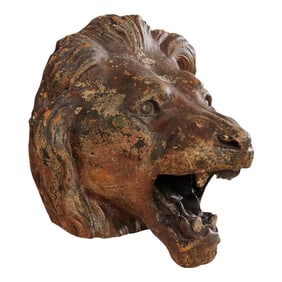 A Terracotta Lion's Head Wall Plaque