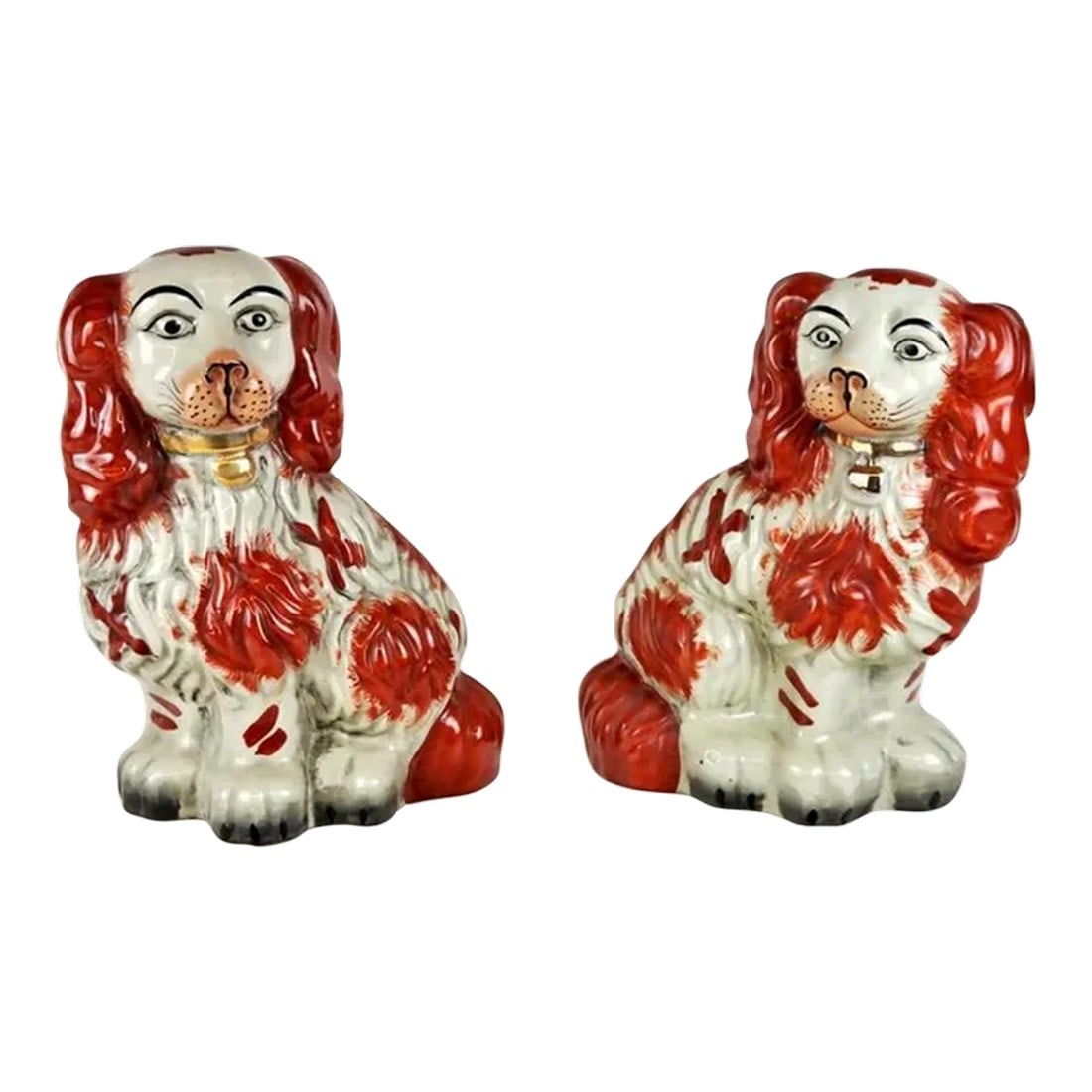 Early 20th Century Staffordshiore Style Porcelain King Charles Spaniels Figurines Shades of Red and: A very nice decorative aged pair of King Charles spaniel figurines in the staffordshire style Condition: Alterations: Original Condition Unaltered Imperfections: Some Imperfections Condition Notes: In