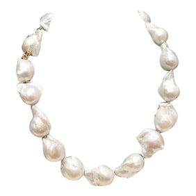 White Baroque Pearls With Pearl Push Clasp in 18k Yellow Gold and Two Princess Cut Diamonds.