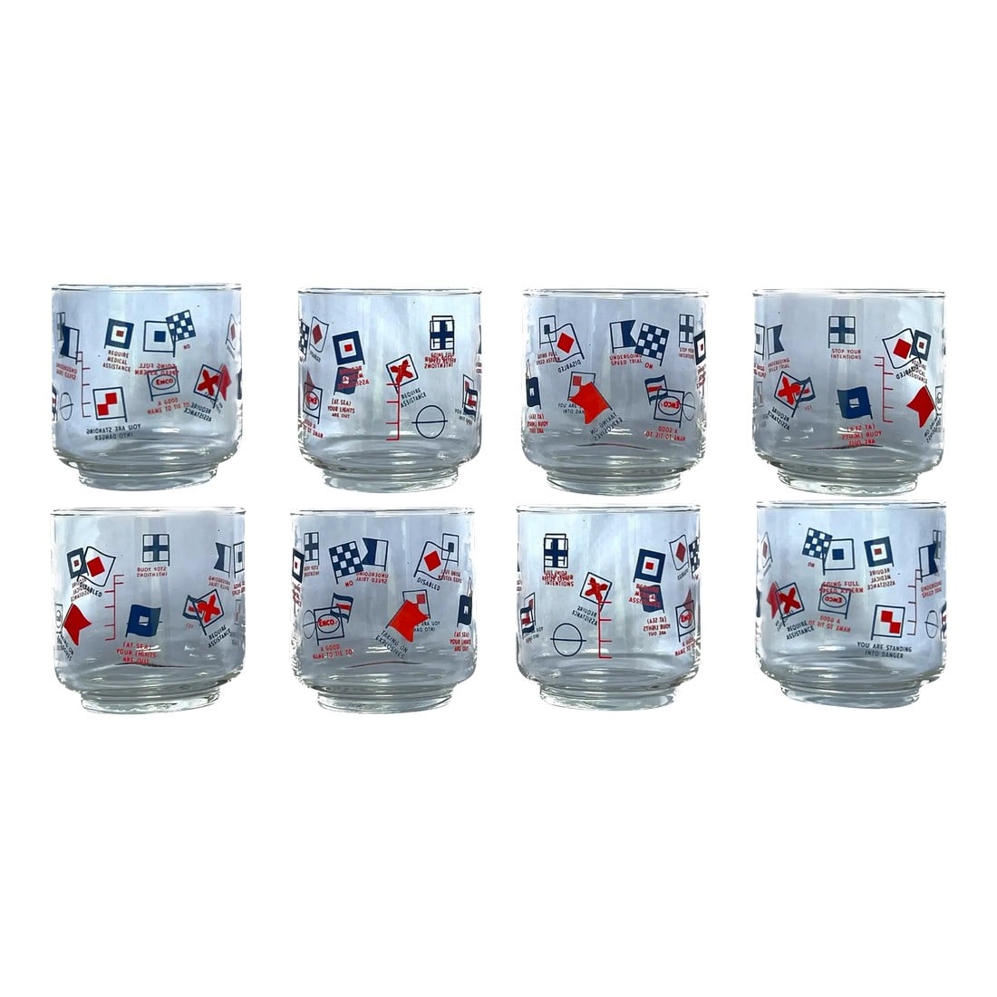 Vintage Nautical Enco Whiskey Glasses With Semaphore Flags Whisky Glasses - Set of 8: Set of eight Vintage Enco Whiskey Glasses with Sephamore Design and Plimsol Line. Glasses feature nautical flags and funny phrases in the context of driking alcohol such as "undergoing speed trial", "