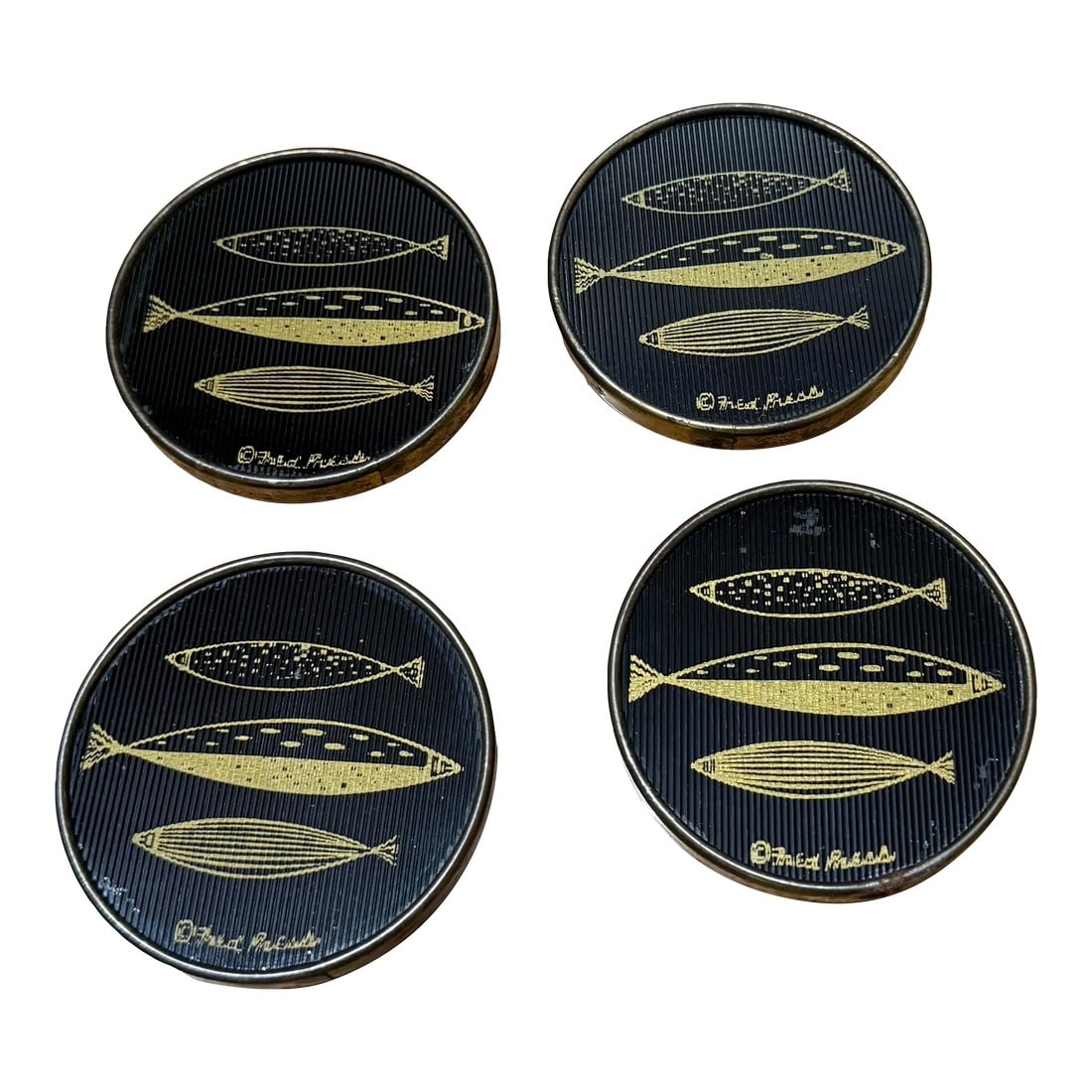 Mid-Century Modern Fred Press Fish Coasters - A Set of 4: A rare set of Fred Press Mid-Century Black & Gold Fish Coasters. They have textured glass or acrylic fronts, with a gold metal rim, and cork bottoms. The gold metal is tarnished, see pictures. 3" Widt