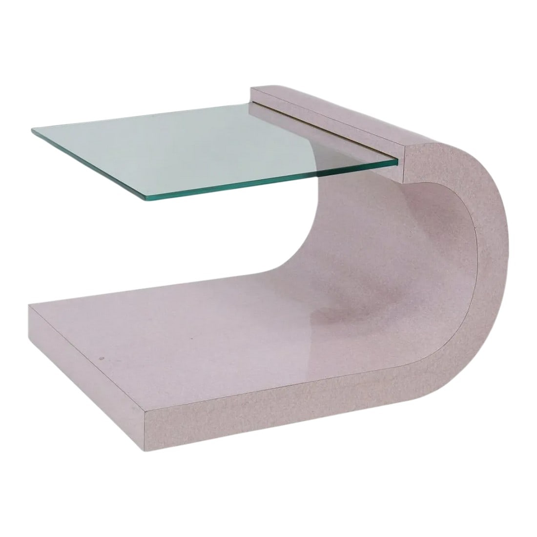 1980s Postmodern Cantilevered Side Table in the Style of Karl Springer: 1980s Laminate & Glass Cantilever Side Table in the style of Karl Springer (1931-1991), c.1980s. This table features inset glass top, pink laminate base. Dimensions approx 20.5"h, 30"l, 24"w * Acquire