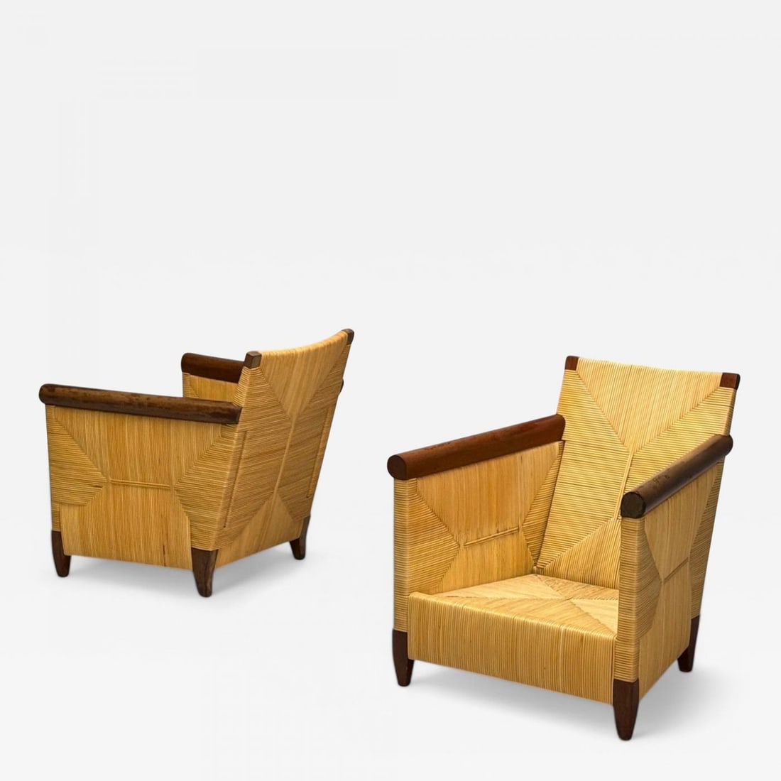 John Hutton, Donghia, Mahogany, Wicker Cane, Merbau Lounge Chairs, USA, 1995: Title:John Hutton, Donghia, Mahogany, Wicker Cane, Merbau Lounge Chairs, USA, 1995 Description:John Hutton, Donghia, Mahogany, Wicker Cane, Merbau Lounge Chairs, USA, 1995 Pair of lounge chairs from J