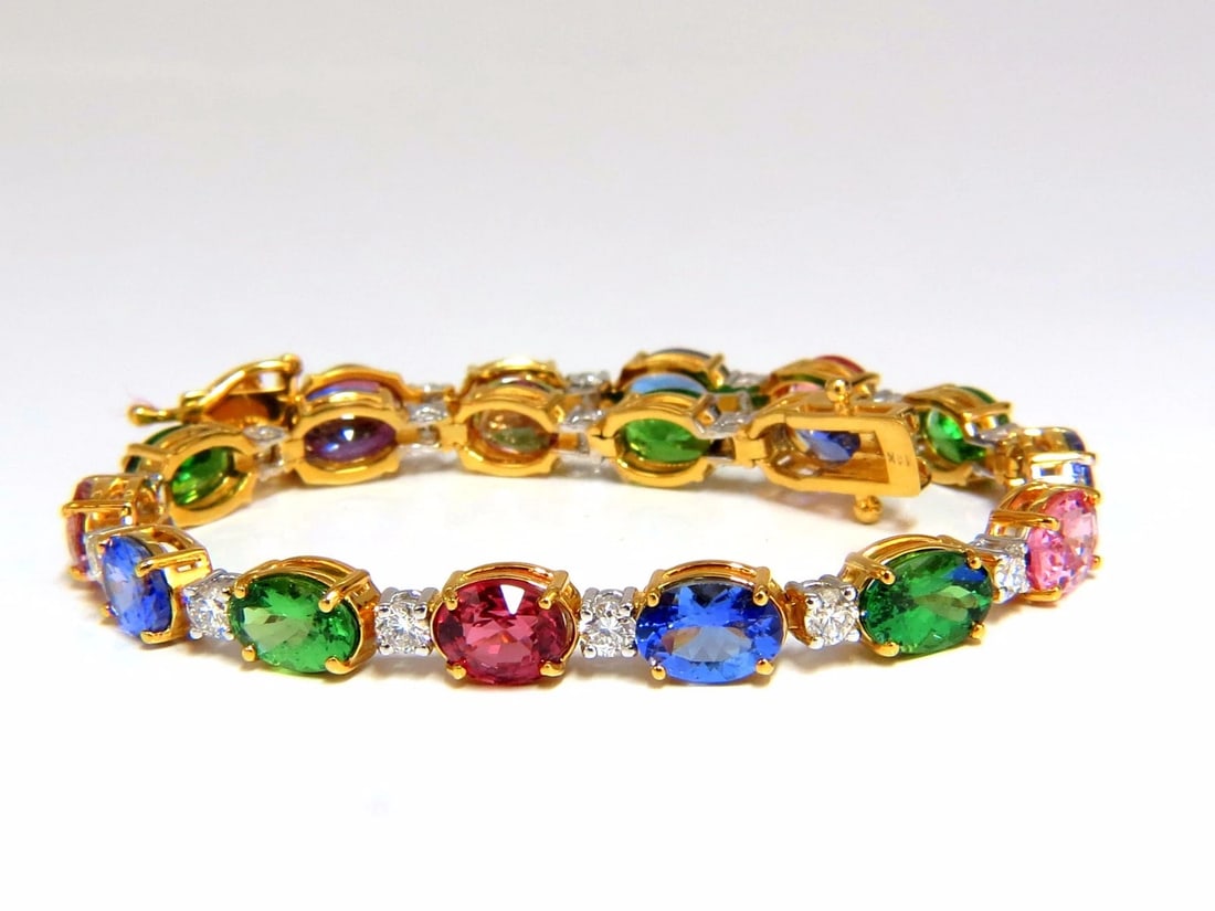 15.68ct natural Tsavortie Spinel Tanzanite diamonds tennis Bracelet 14k+: Title:15.68ct natural Tsavortie Spinel Tanzanite diamonds tennis Bracelet 14k+ Description:Color Palette. 14.28ct. Natural Tsavorites, Spinels, Tanzanite, & 1.40ct Diamonds bracelet. Full oval cuts, g