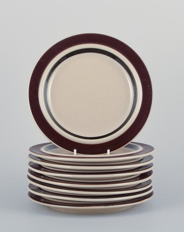 Raija Uosikkinen and Ulla Procopé for Arabia, Finland. A set of nine "Ruija" lunch plates in: Title:Raija Uosikkinen and Ulla Procopé for Arabia, Finland. A set of nine "Ruija" lunch plates in stoneware with brown decoration. Description:Raija Uosikkinen (1923–2004) and Ulla Procop&