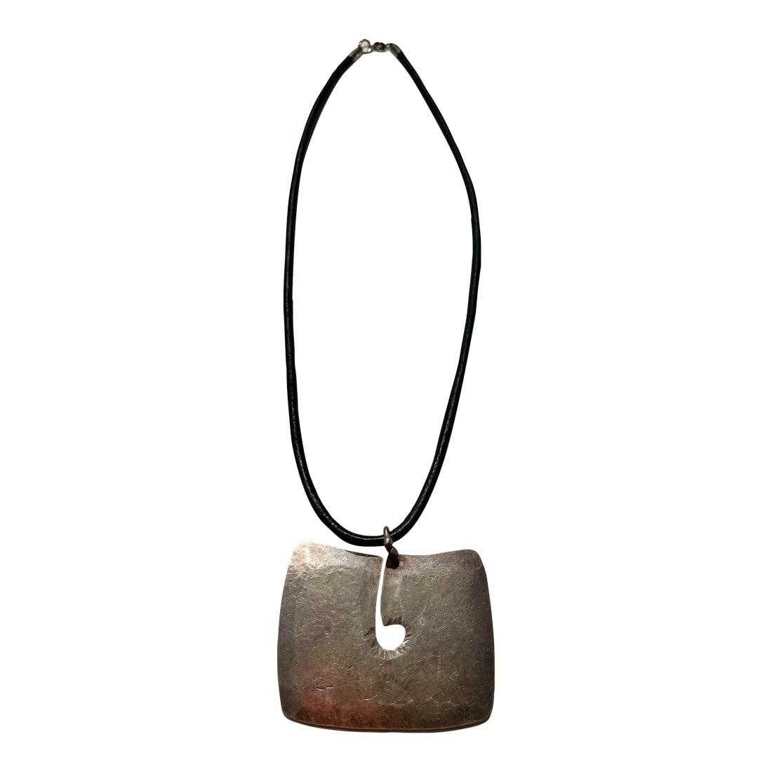 Harry Bertoia Pendant: This is a hand-hammered reproduction of a rare design that Harry Bertoia did at the Bertoia Studio in the 1970s, Bertoia toyed with creating a complete line of jewelry since the 1940s but it never mat
