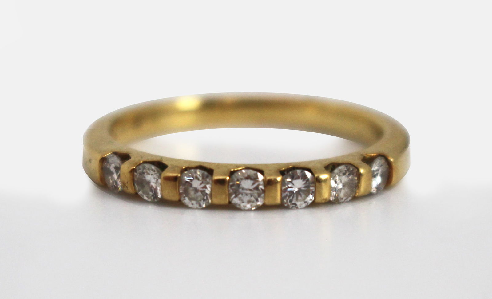 Diamond Half eternity Ring: Title: Diamond Half eternity Ring Description: Vintage 18ct Gold Diamond Half eternity Ring A timeless and elegant 18ct yellow gold diamond half eternity ring, perfect for stacking or wearing alone. D