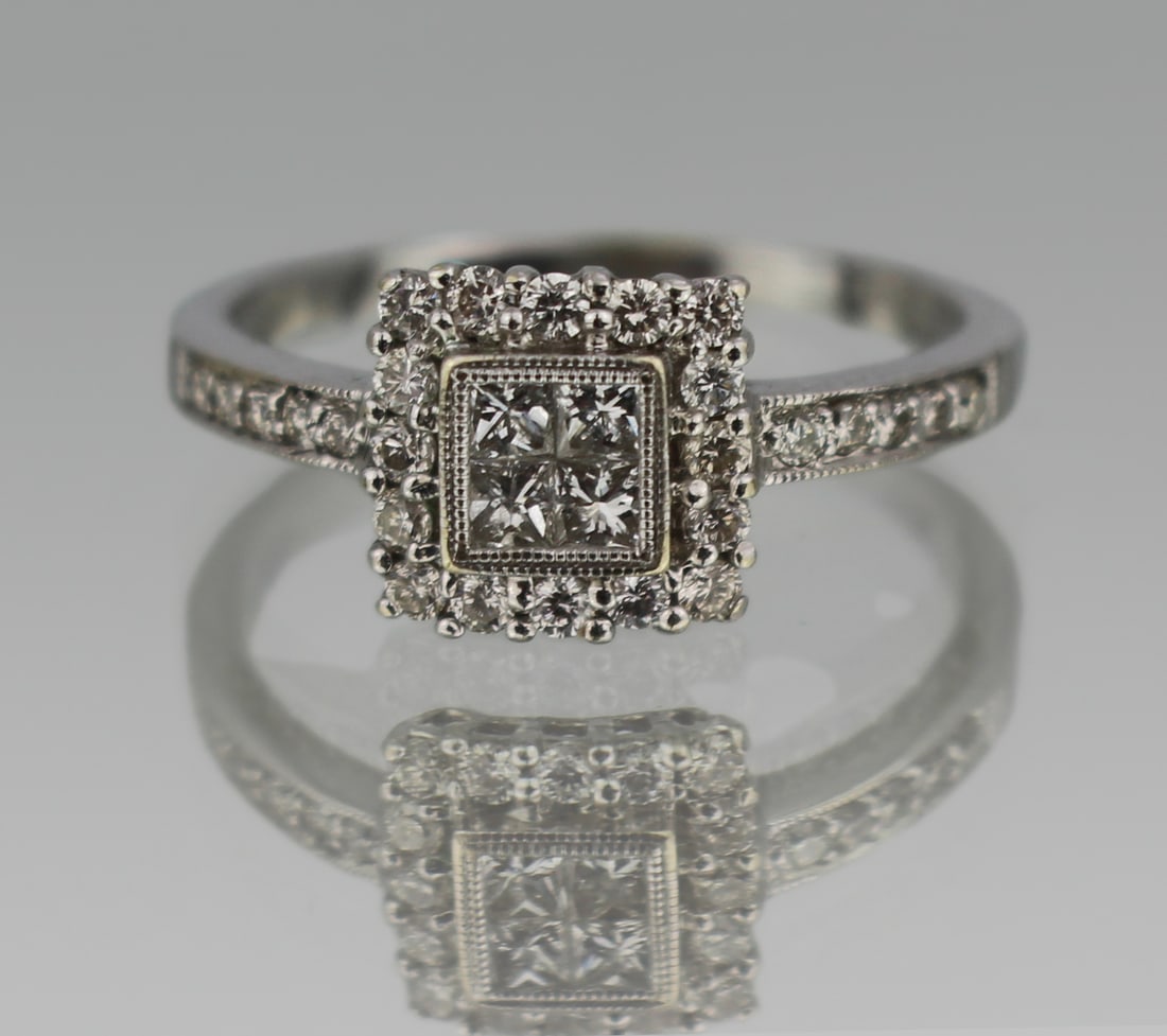 Diamond 18ct White Gold Ring 0.70 carat: Title: Diamond 18ct White Gold Ring 0.70 carat Description: Diamond 18ct White Gold Ring 0.70 carat Fine vintage 18ct white gold ring Diamond set shouldered shank onto a square cluster style head. 4 c