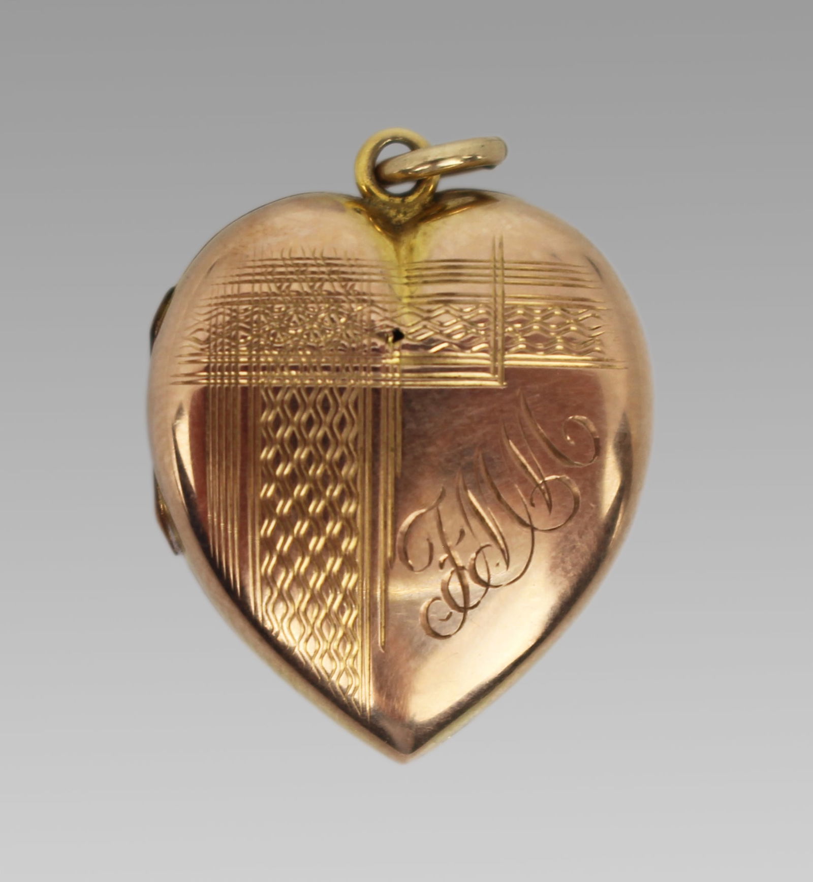 Vintage 9ct Gold Back and Front Heart Locket: Title: Vintage 9ct Gold Back and Front Heart Locket Description: Vintage 9ct Gold Back and Front Heart Locket A charming vintage heart-shaped locket dating to the 1940s, engraved to the front with an