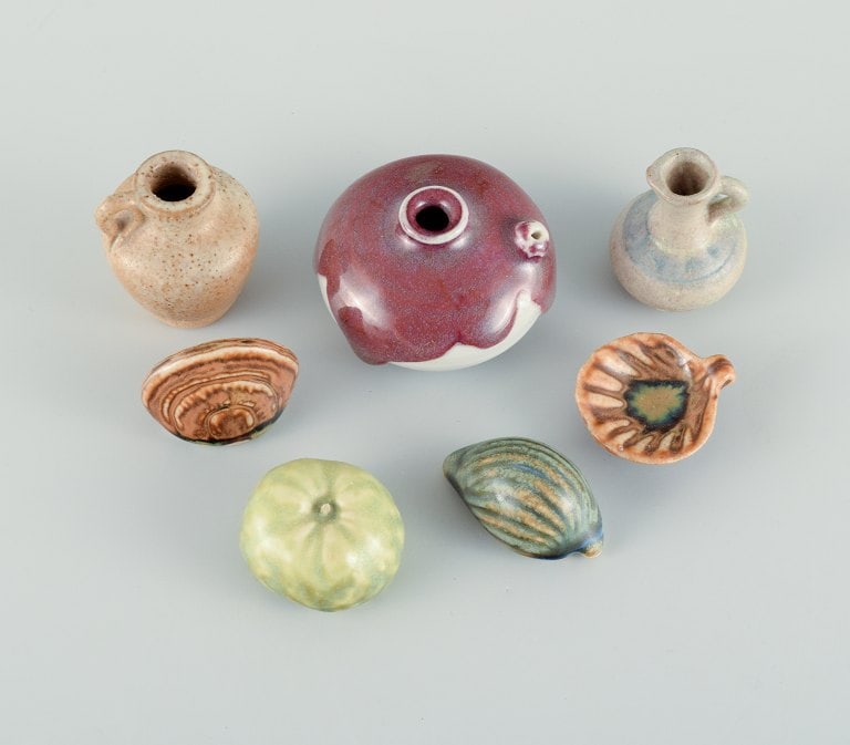Swedish studio potters, seven miniature vases, jugs and snail shells etc. Late 1900s. (1 of 9)