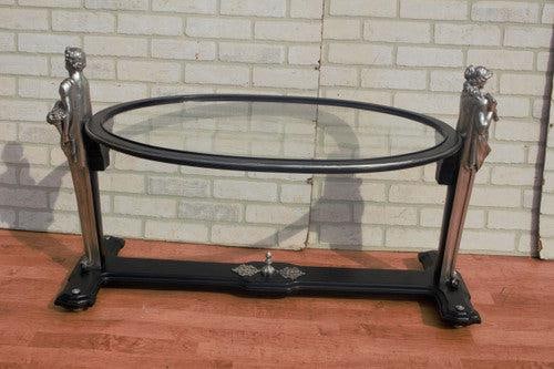 Art Nouveau Figural Male and Female Bust Glass Top Coffee Table: Vintage from before 2000 Materials: glass, metal *** Shipping is NOT Free, please contact us for a shipping quote. French Art Nouveau Carved Figural Male and Female Bust Flanked Ebonized Framed