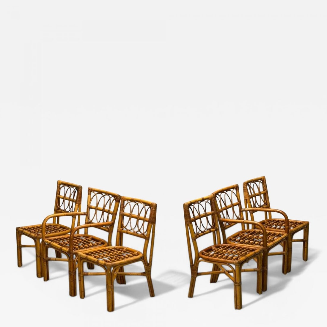 Bielecky Brothers, Modern, Six Dining Chairs, Rattan, Cane, USA, 21st C.: Description: Bielecky Brothers, Modern, Six Dining Chairs, Rattan, Bamboo, Cane, USA, 21st C. Set of six rattan and cane dining chairs from the early 2000s handmade by Bielecky Brothers in New York. F