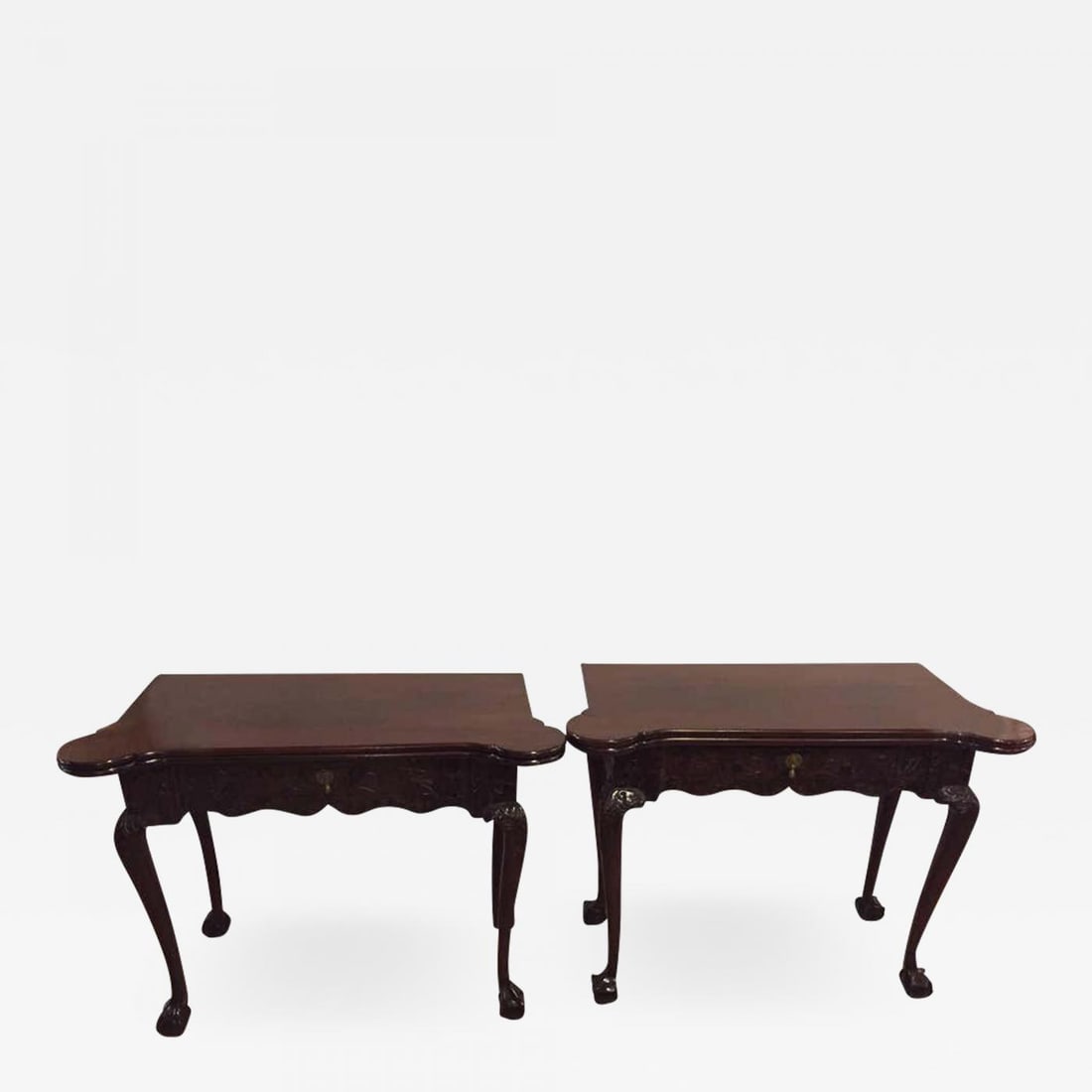 Period 1820s Irish Card / Tea Tables Solid Mahogany with Later Carvings: Description: Period pair of Irish card or tea tables solid mahogany with later carvings. These wonderfully carved card tables have cabriole legs and ball and claw feet. Each having a center drawer lea