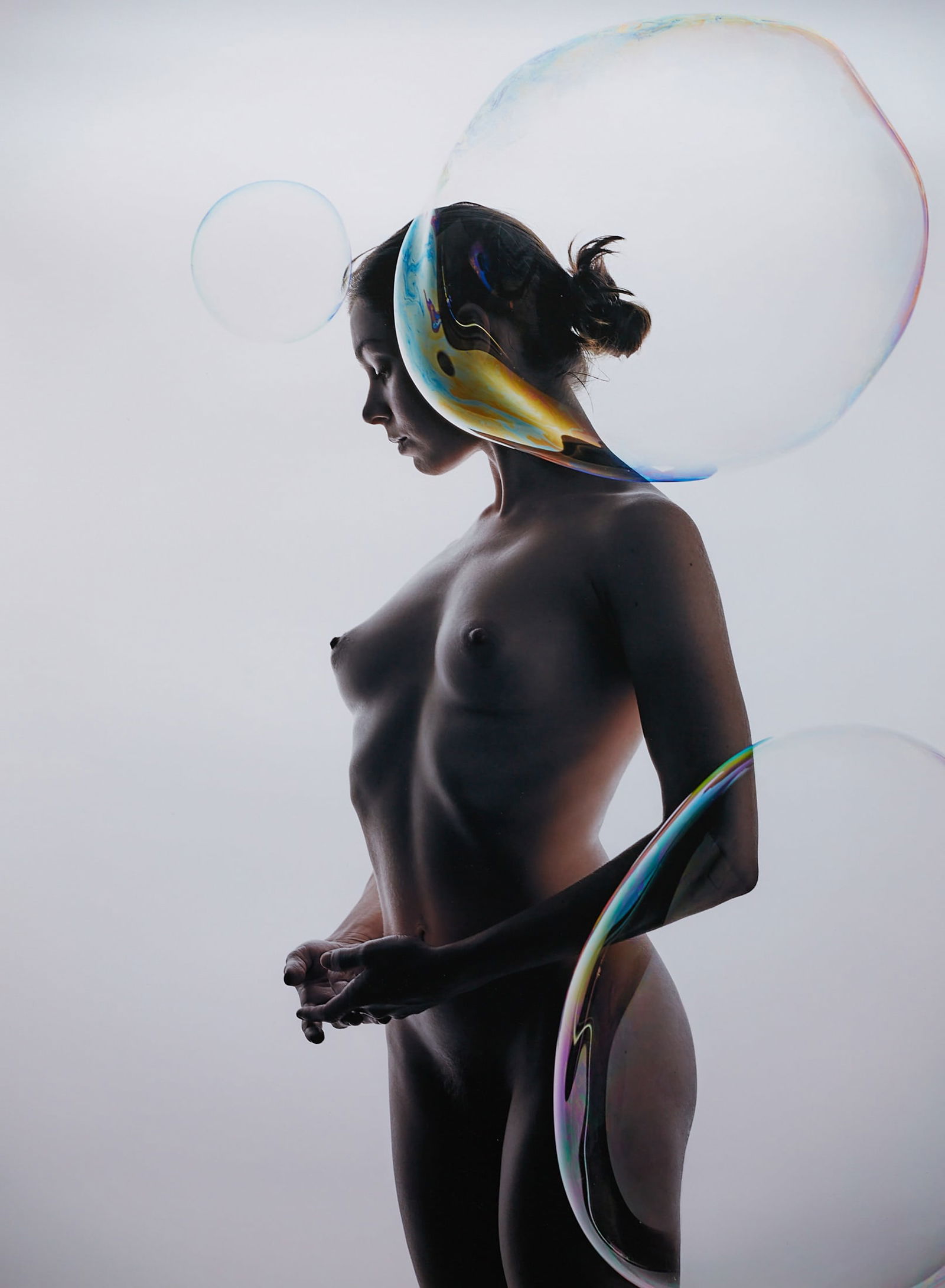 3 Bubbles: Title:3 Bubbles Artist:Spiros Politis(1969-) Date/Period:2018 Materials:photography Size:24" x20" Description:3 bubbles and a nude woman.All done 'in camera' in one shot. No AI and no photoshop compos