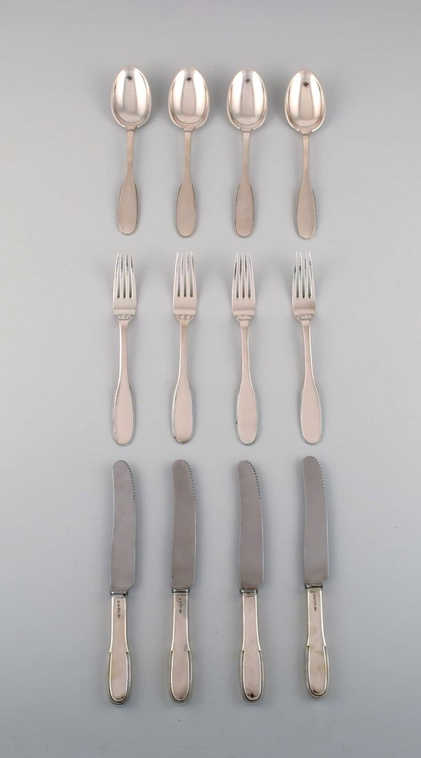 Evald Nielsen number 14 dinner service in hammered silver (830) for four people. 1920s. (1 of 4)