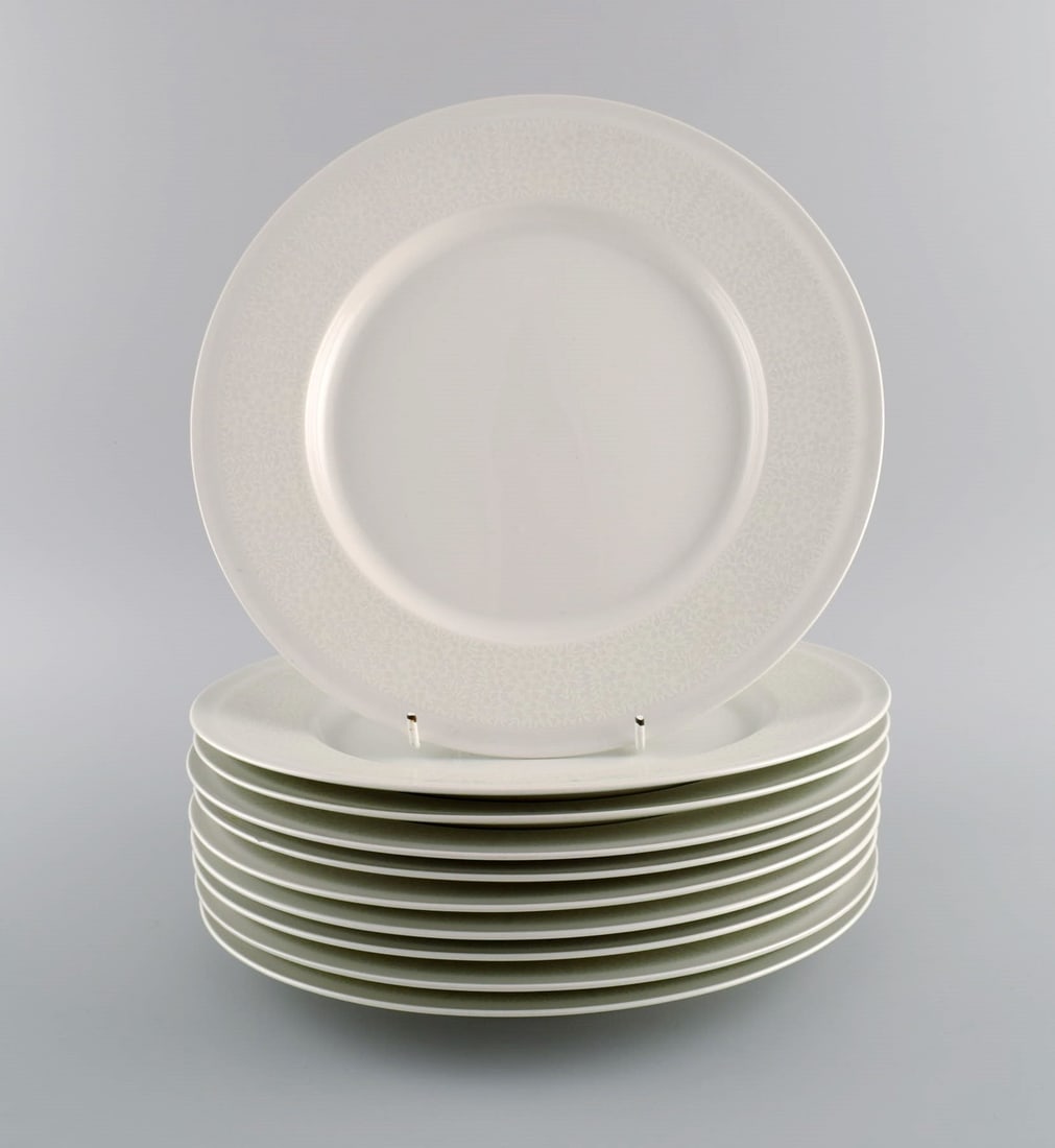 Raija Uosikkinen for Arabia. 10 rare Pitsi dinner plates with floral decoration. Dated 1967-1974.: Raija Uosikkinen for Arabia. 10 rare Pitsi dinner plates with floral decoration. Dated 1967-1974. Diameter: 26 cm. In excellent condition. Stamped. Reserve: $469.00 Shipping: Domestic: Shipping rates