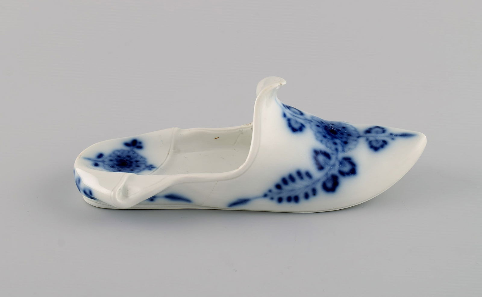 Meissen, Germany. Antique miniature slipper in hand-painted porcelain. Late 19th century.: Meissen, Germany. Antique miniature slipper in hand-painted porcelain. Late 19th century. Measures: 16.5 x 6 cm. In very good condition. Micro chip. Stamped. Reserve: $175.00 Shipping: Domestic: Shipp