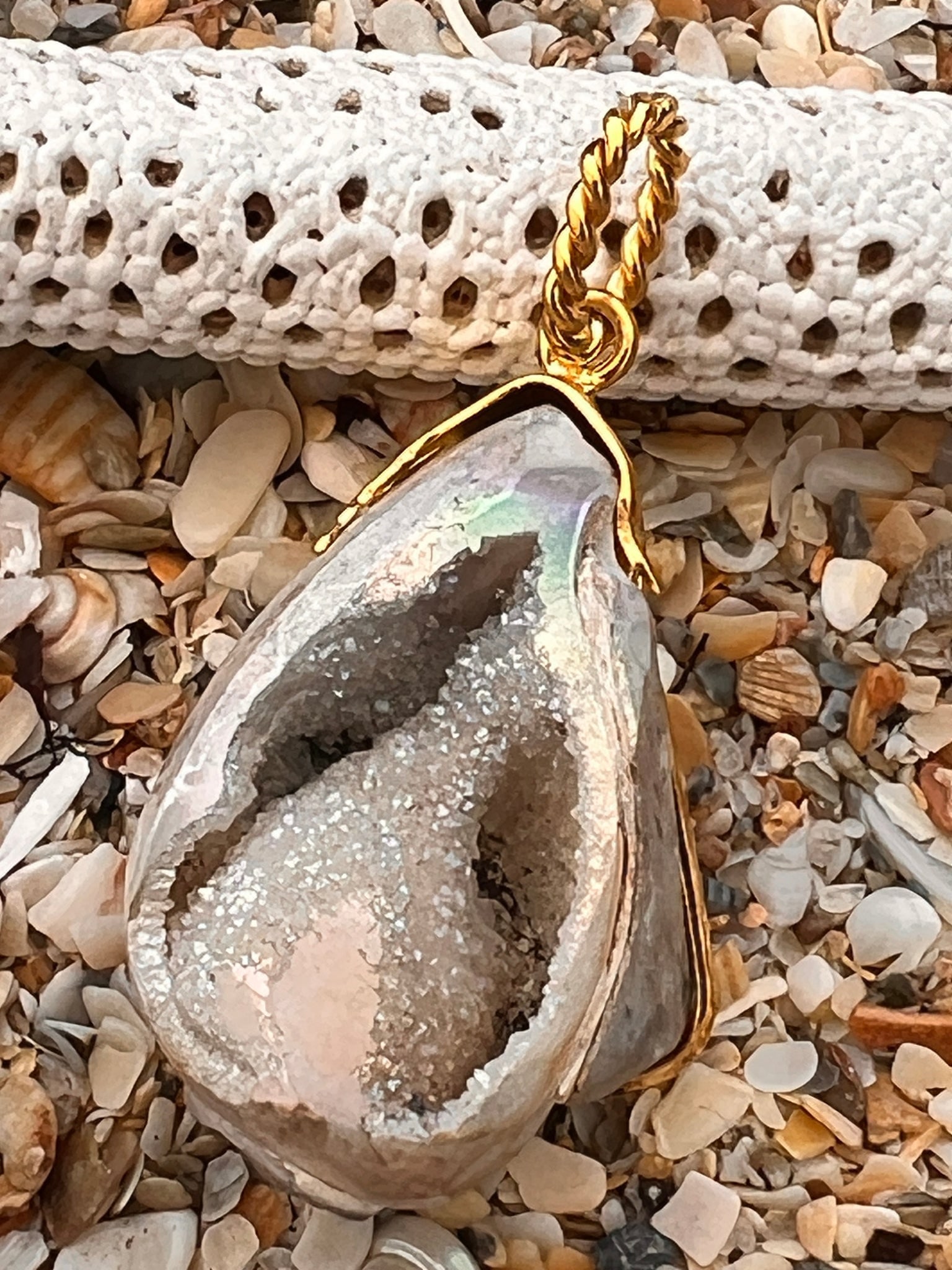 Fossilized Shell Pendant with Crystal: Title:Fossilized Shell Pendant with Crystal Description:Interesting Indian Fossil Shell filled with small white crystal - large twisted bale - Vermeil - Signed CSS - 2.25" Drop Reserve: $420.00 Shippi