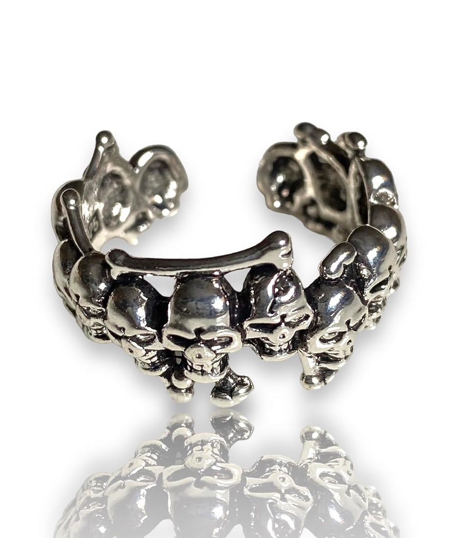 925 Sterling Silver Skulls Ring: Edgy Statement Piece with 14 Intricate Skull Heads and Bones: Title: 925 Sterling Silver Skulls Ring: Edgy Statement Piece with 14 Intricate Skull Heads and Bones Description:The centerpiece of this ring is the band itself, which is formed by a series of 14 intr