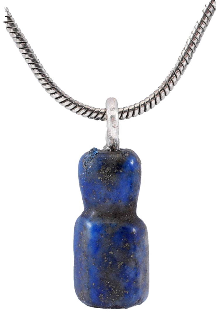 VIKING LAPIS LAZULI AMULET C.800-1050 AD: Hand crafted gem stone of bottle form with faceted body and compressed neck. Part of a larger necklace of “aegis” form with several tiers strung and cross bound into a matrix. These amulet