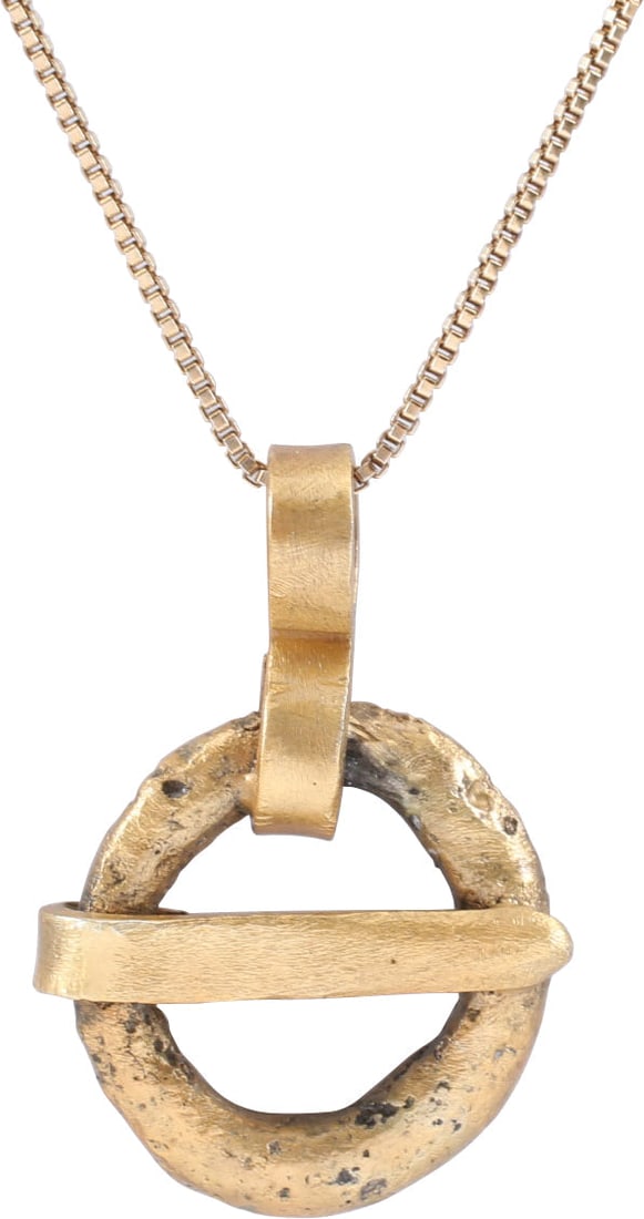 VIKING PROTECTIVE BROOCH, 9TH-11TH CENTURY AD: Gilt bronze, worn in numbers on the surface of the jerkin, to provide a measure of protection against sword cuts and, in fact, were a form of armor. See current Public Television programming for docum