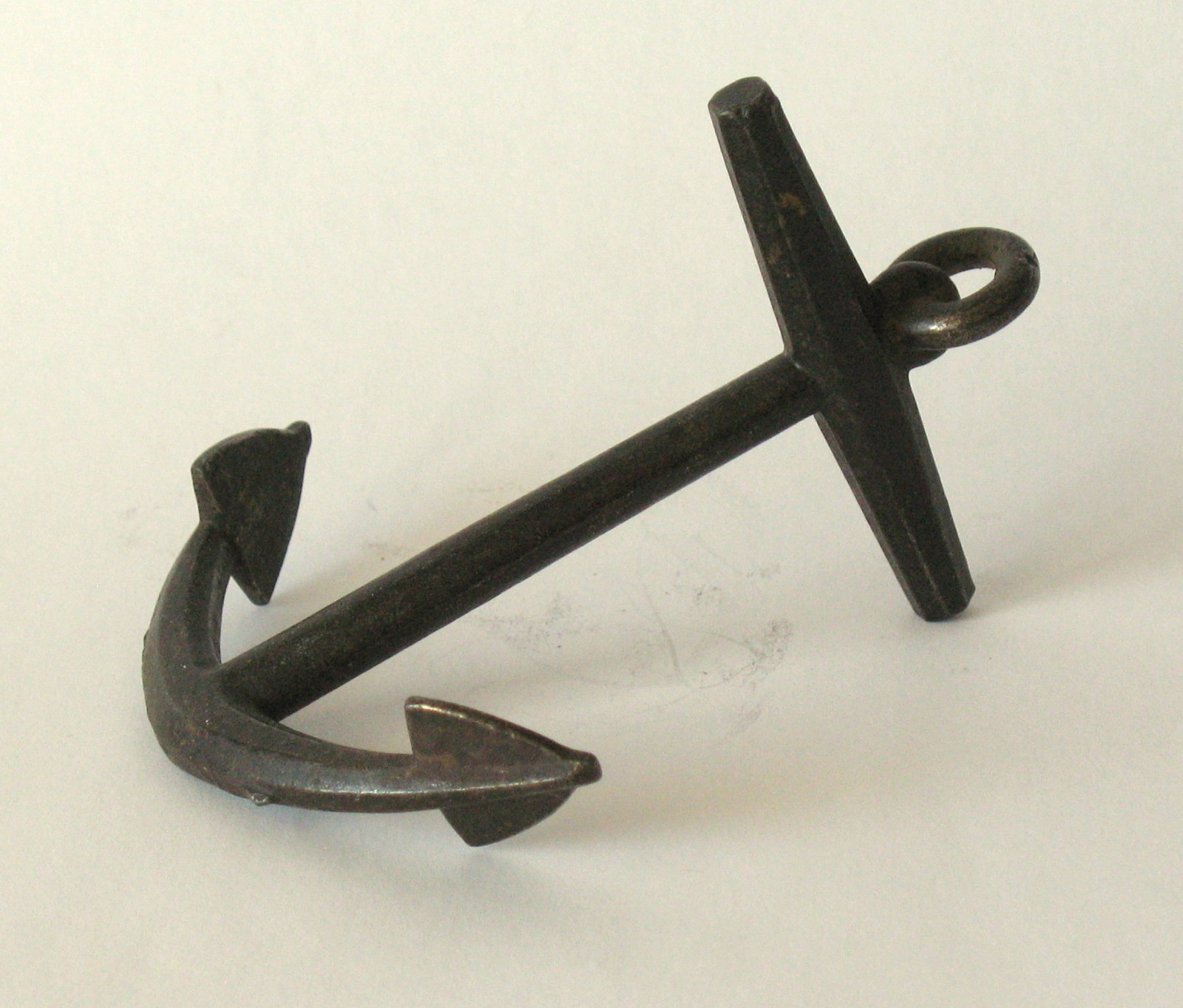 Vintage cast metal anchor paper weight.: Title: Vintage cast metal anchor paper weight. Date/Period: 1930's Dimension: 4” x 3 1/2” x 2 1/2” Additional Information: Nice vintage cast metal anchor paper weight in great all or