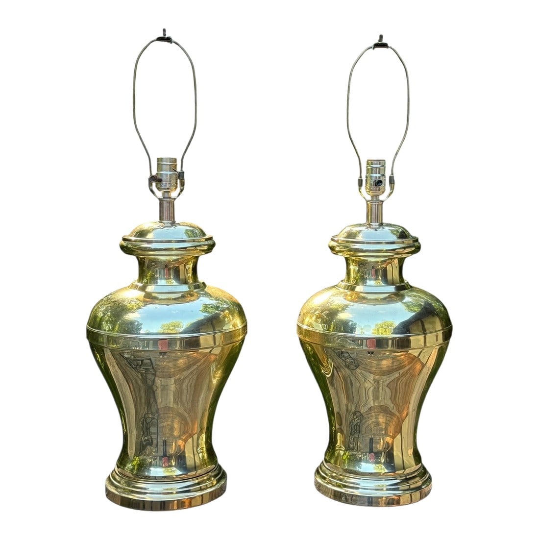 1980s Large Brass Ginger Jar Lamps - A Pair: A pair of large brass ginger jar lamps. Original harp and finial. 19" tall to top of jar and 25" to top of harp. 10.5" round. They will be shipped separately These are in vintage aged condition showin