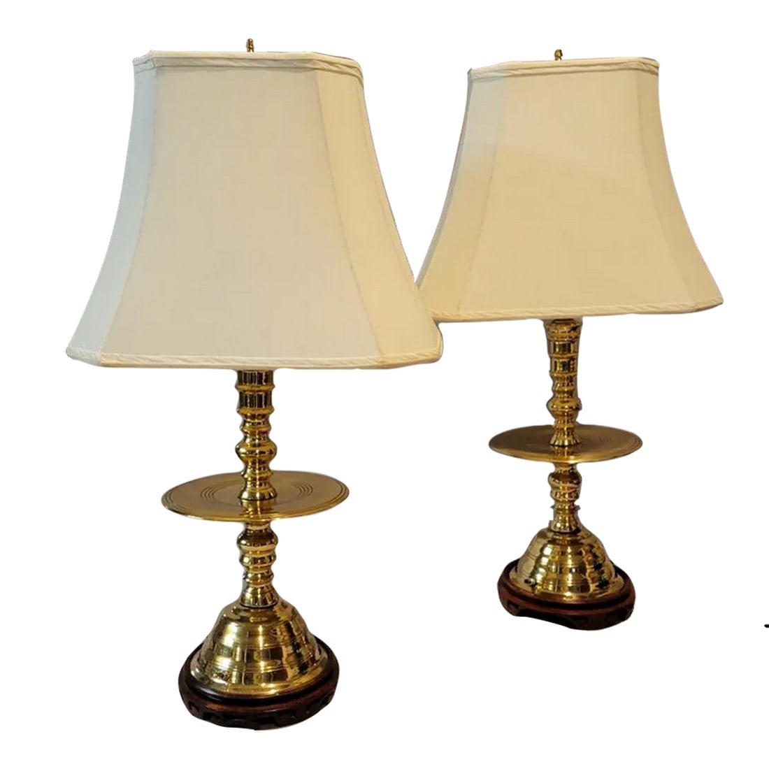 Vintage Asian Brass Altar Candlestick Table Lamps - a Pair: A pair of stunning early 20th century Southeast Asian altar solid brass candlestick holders that were polished, lacquered and converted into table lamps in the 1970's. Came from the Pinehurst, NC esta
