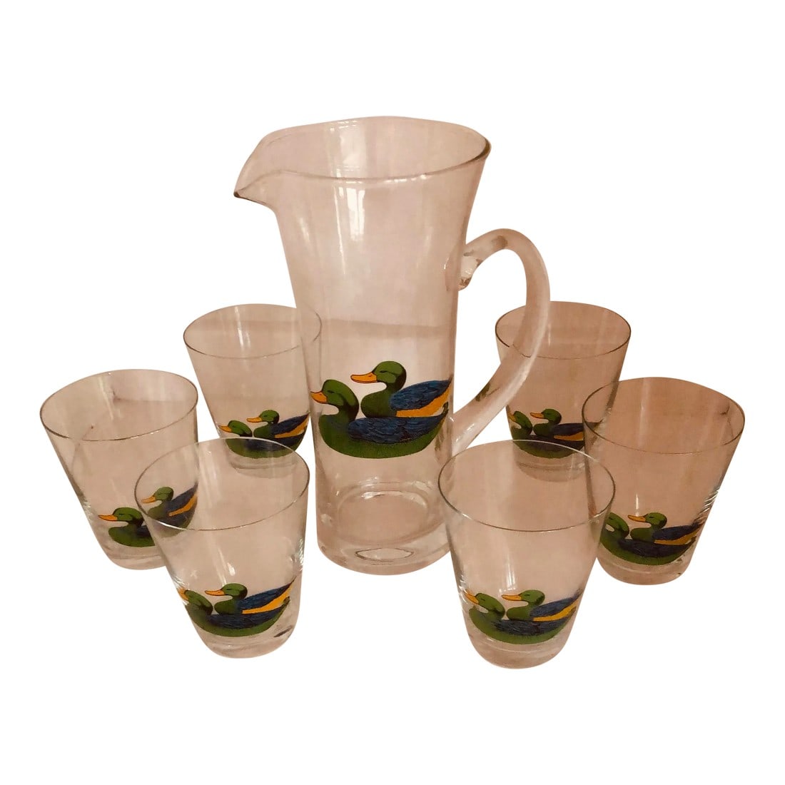 1930s Mallard Duck Pitcher With Glasses Set- 7 Pieces: Gorgeous 1930s pitcher and glasses set. The set depicts colorful mallard ducks in bright blue, green and yellow. The pitcher stands 9" tall and each glass is 4". Excellent condition for its age. The v
