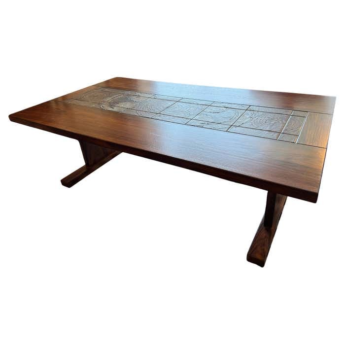 Mid-Century Danish Coffee Table with Rectangular Ceramic Tiles Center Piece: Title: Mid-Century Danish Coffee Table with Rectangular Ceramic Tiles Center Piece Description: This Danish rectangular coffee table presents a richly grained teak top accented by an inset panel of te