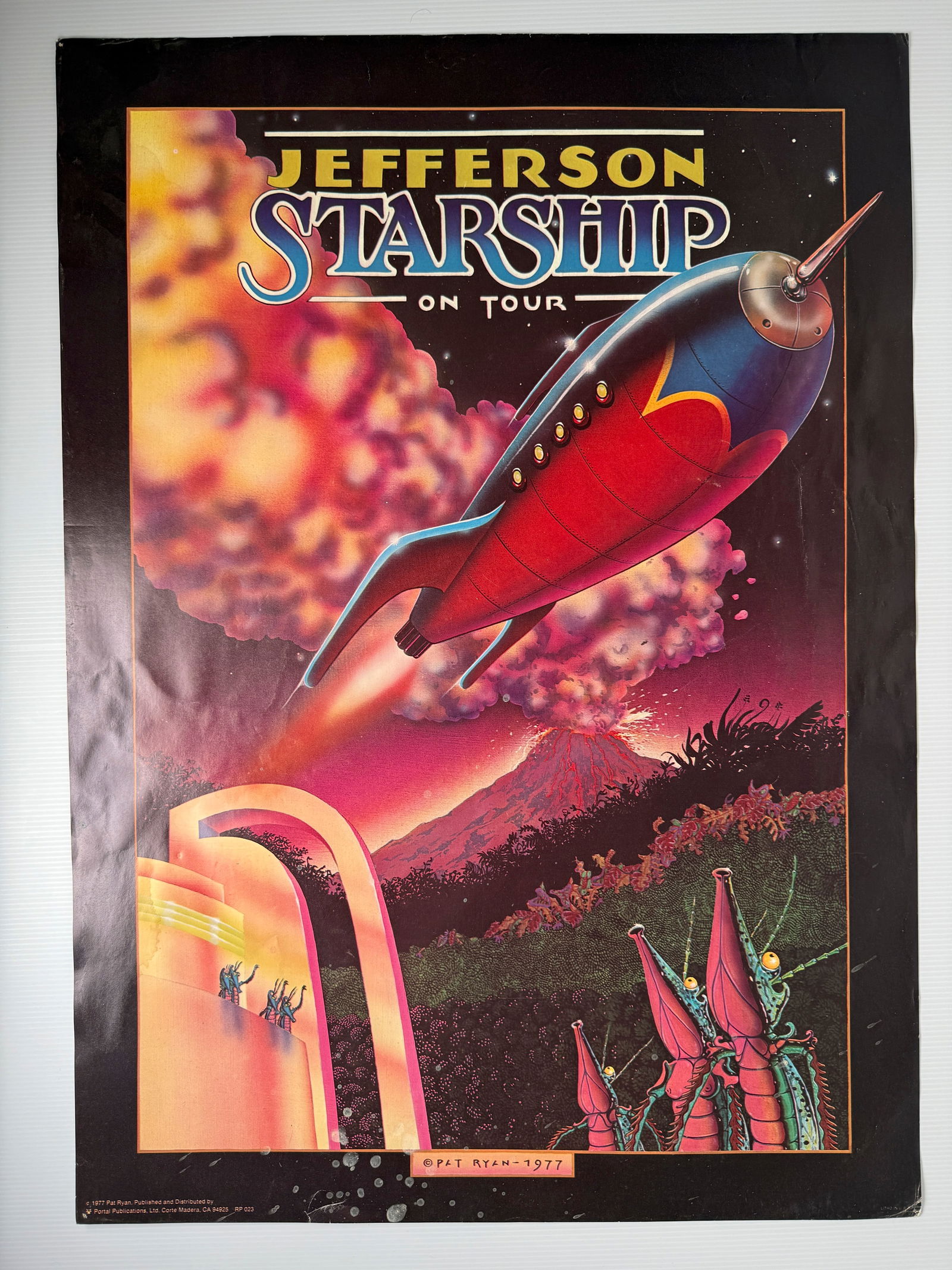 1977 JEFFERSON STARSHIP TOUR POSTER: Title: 1977 JEFFERSON STARSHIP TOUR POSTER Description: 1977 JEFFERSON STARSHIP TOUR POSTER BY PAT RYAN AND PORTAL PUBLICATIONS. VERY SIMILAR IN STYLE TO RANDY TUTEN. JUST UNDER 24 X 36. Reserve: $10.