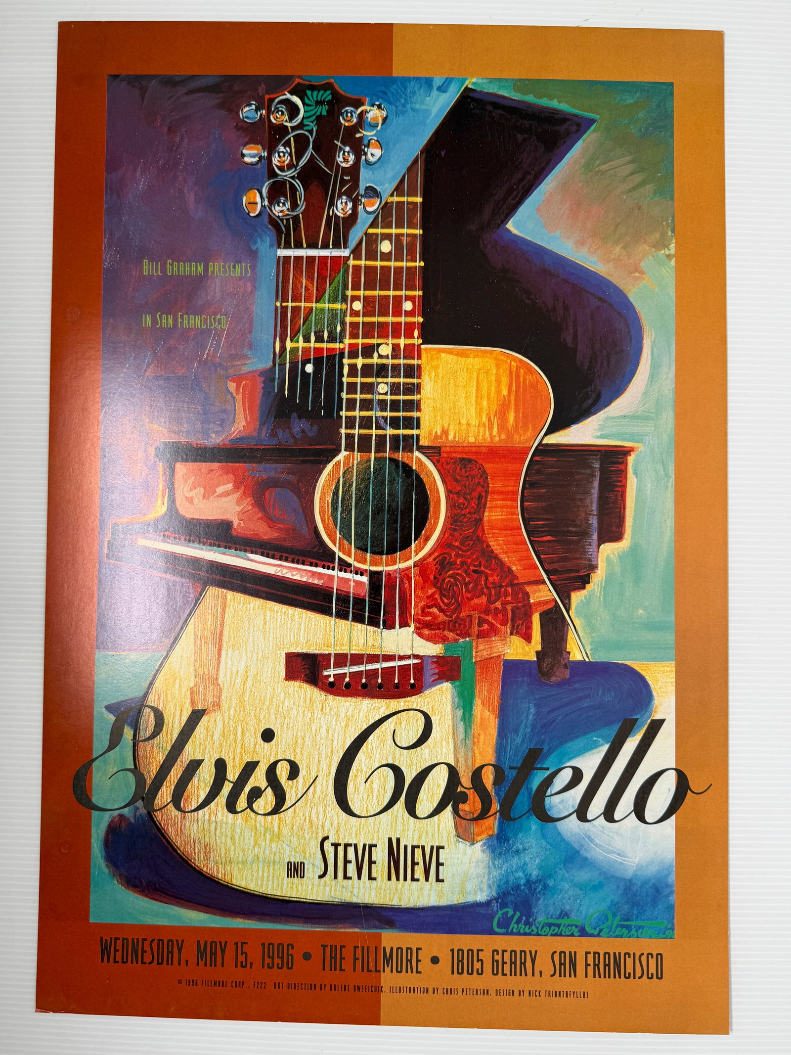 ELVIS COSTELLO AT THE FILLMORE 1996: Title: ELVIS COSTELLO AT THE FILLMORE 1996 Description: ELVIS COSTELLO AT THE FILLMORE 1996 ABOUT 14 X 21 Reserve: $10.00 Shipping: Domestic: Flat-rate of $12.00 to anywhere within the contiguous U.S.