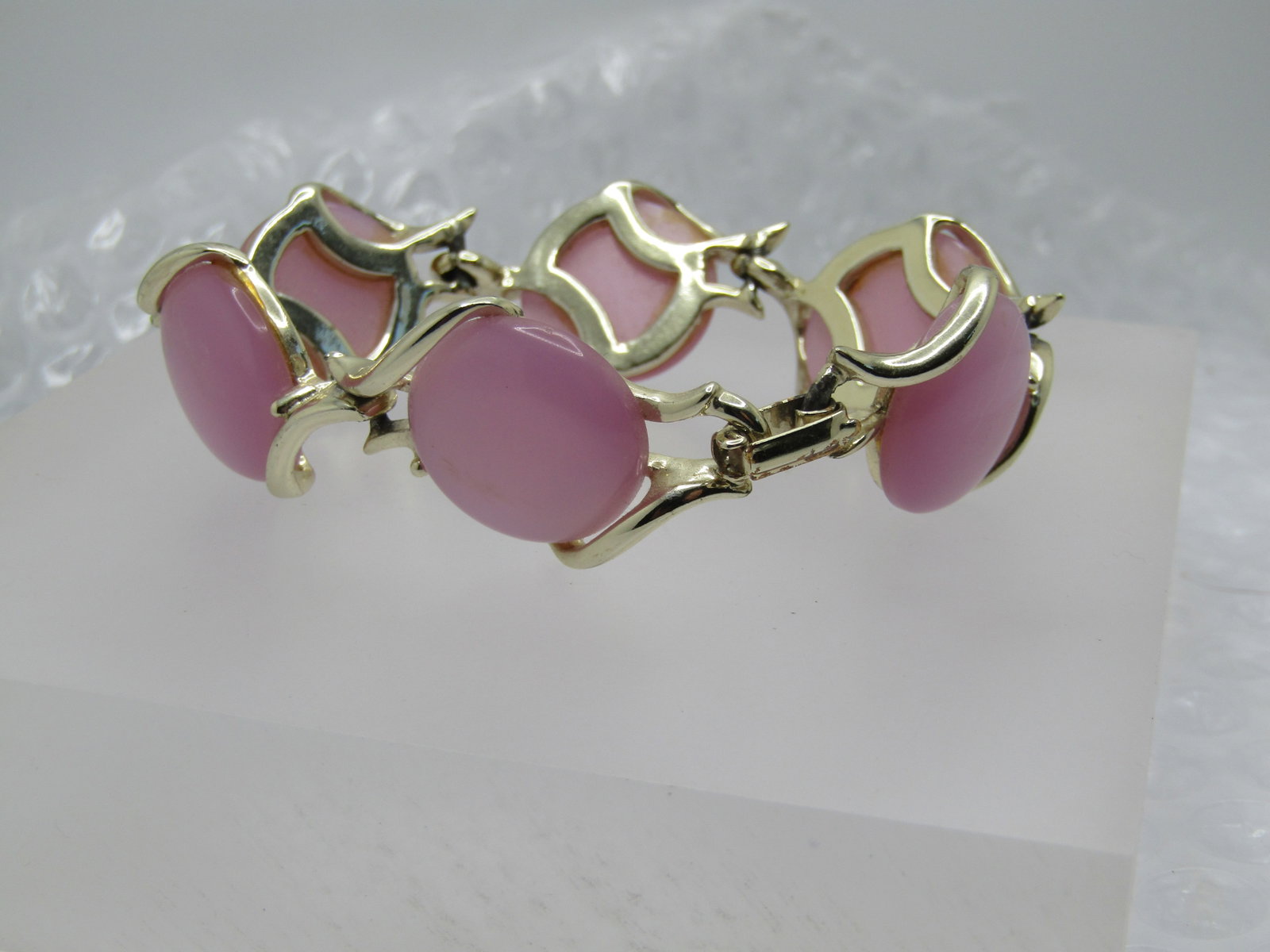 Vintage Pink Thermoset Bracelet, 7", 1950's-1960's: Title: Vintage Pink Thermoset Bracelet, 7", 1950's-1960's Description: Vintage Pink Thermoset Bracelet, 7", 1950's-1960's. Gold tone with wispy curved accents that hold the 3/4" round pink thermoset s