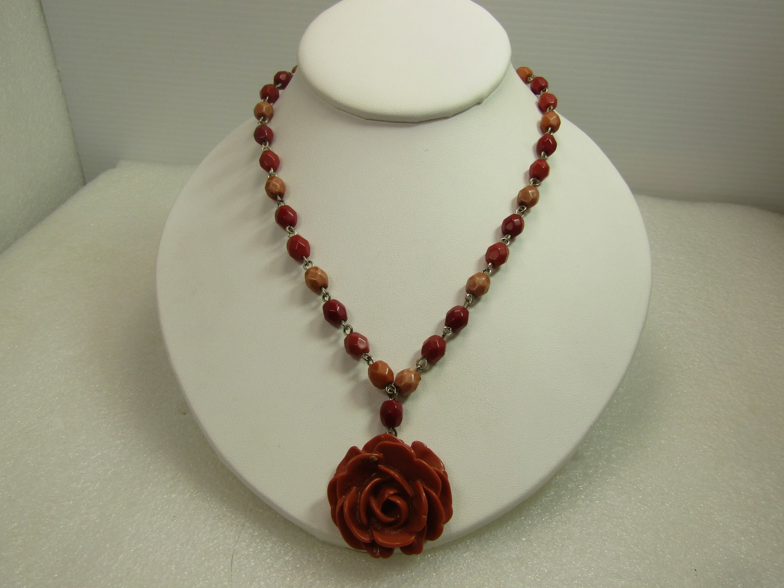 Vintage Avon Faux Coral Carved Rose Necklace, 18-20", 1980's: Title: Vintage Avon Faux Coral Carved Rose Necklace, 18-20", 1980's Description: Vintage Avon Faux Coral Carved Rose Necklace, 18-20", 1980's. This has a carved faux coral rose that drop down from a b