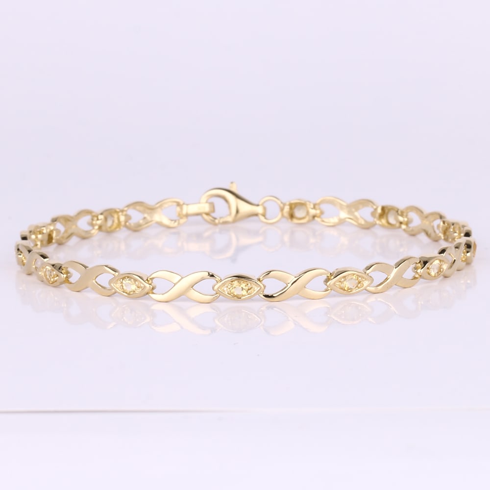 Bracelet: Citrine Round 2.20mm: Item:Bracelet Description: Citrine Round 2.20mm - 12Pcs Date/Period: After 2000 Material: 925 Silver W/Yellow Gold Plating Gross Weight: 4.77 Metal Weight: 4.66 Reserve: $32.00 Shipping: Domestic: Fla