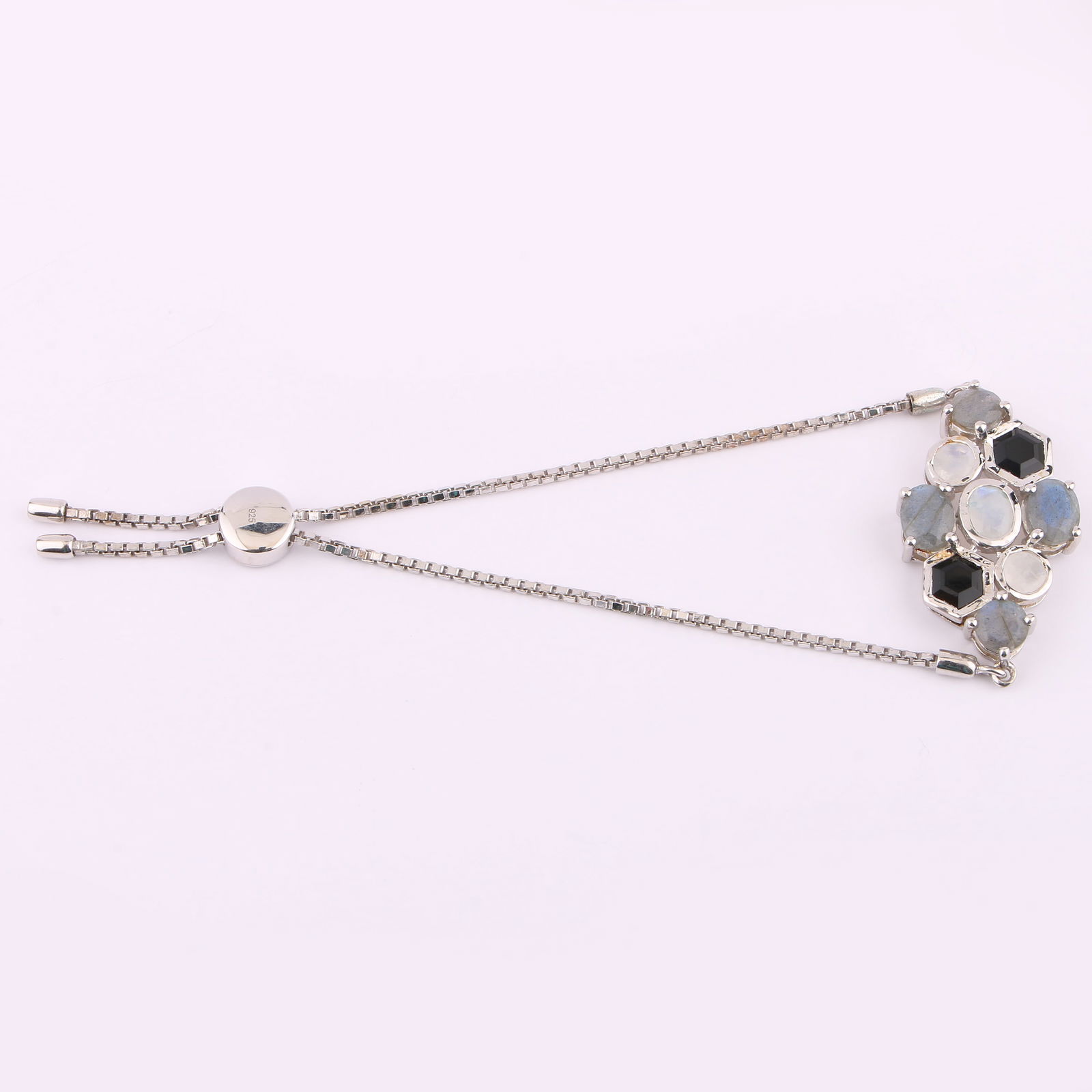 Bracelet: White Rainbow Moonstone Oval 7x5mm: Item:Bracelet Description: White Rainbow Moonstone Oval 7x5mm - 1Pc + White Rainbow Moonstone Round 5.00mm - 2Pcs + Labradorite Oval 8x6mm - 2Pcs + Labradorite Round 6.00mm - 2Pcs + Black Onyx Hexagon