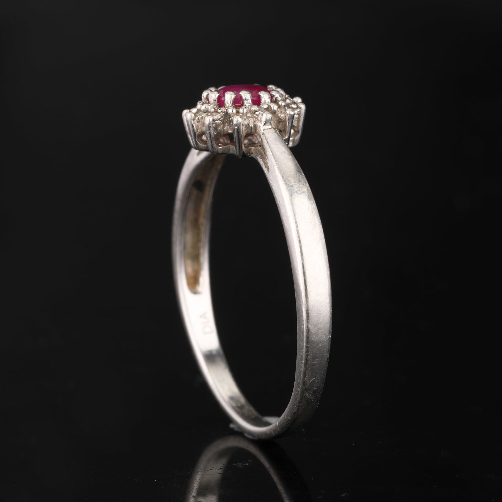 Ring: Bkk Ruby Oval 5x4mm: Item:Ring Description: Bkk Ruby Oval 5x4mm - 1Pc + White Diamond S/C Round 0.90mm - 6Pcs (Box # 3) NO PITS ON STONE SURFACE Date/Period: After 2000 Material: 925 Silver W/Rhodium Gross Weight: 2.3 Met