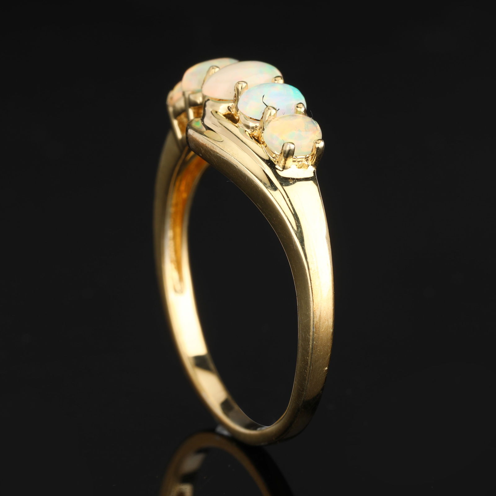 Ring: Ethiopian Opal CAB Oval 6x4mm: Item:Ring Description: Ethiopian Opal CAB Oval 6x4mm - 1Pc + Ethiopian Opal CAB Oval 5x3mm - 2Pcs + Ethiopian Opal CAB Oval 4x3mm - 2Pcs Date/Period: After 2000 Material: 925 Silver W/Yellow Gold Plat