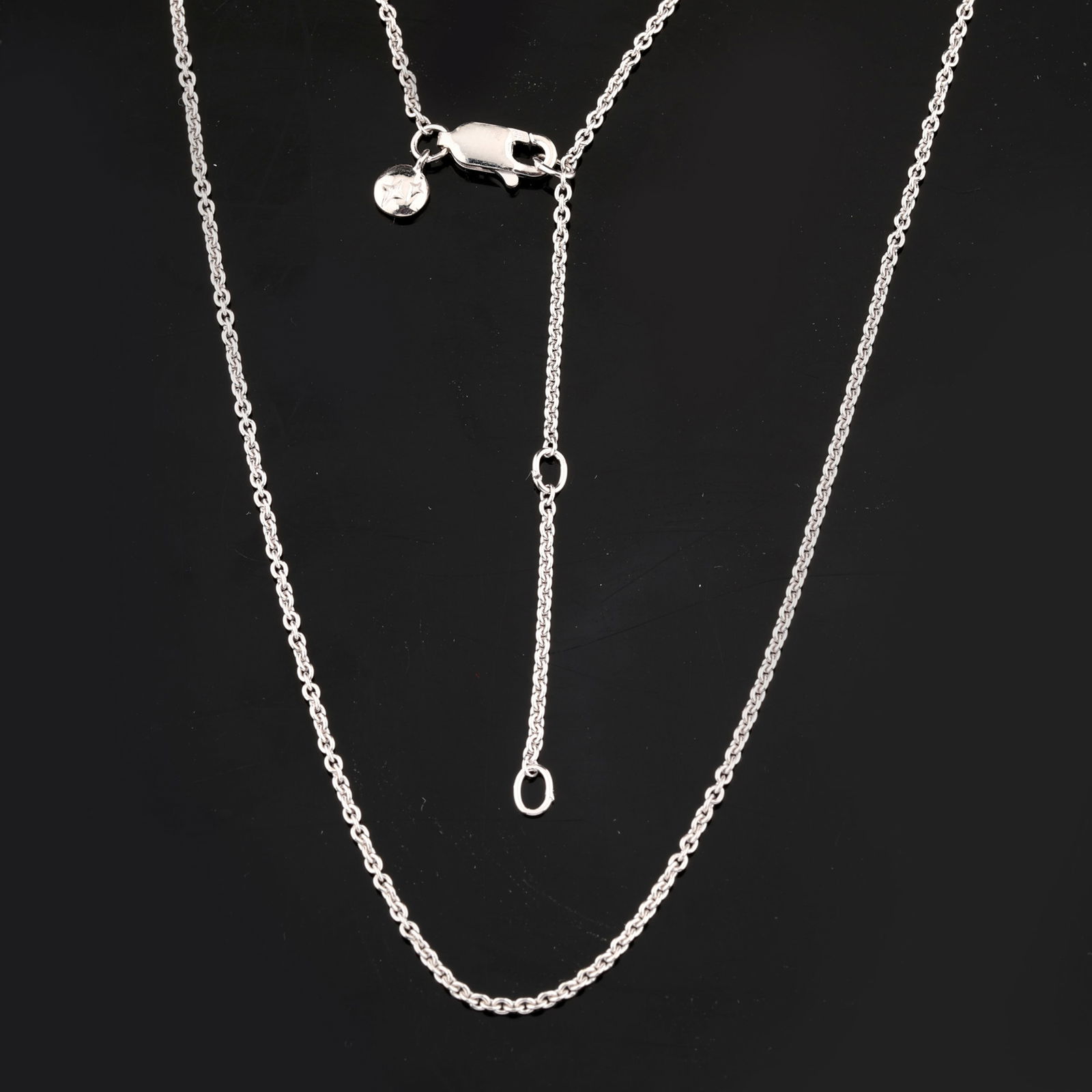 Plain chain: Karizia Rolo Chain (ROLO FTT 040) with Tag and a triple extention 420mm / 390mm / 360mm: Item:Plain chain Description: Karizia Rolo Chain (ROLO FTT 040) with Tag and a triple extention 420mm / 390mm / 360mm Date/Period: After 2000 Material: 925 Silver W/Rhodium Gross Weight: 2.92 Metal We