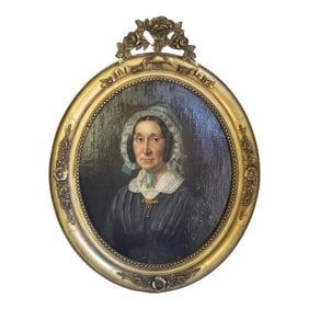 Antique Portrait of a Woman in a Gold Frame
