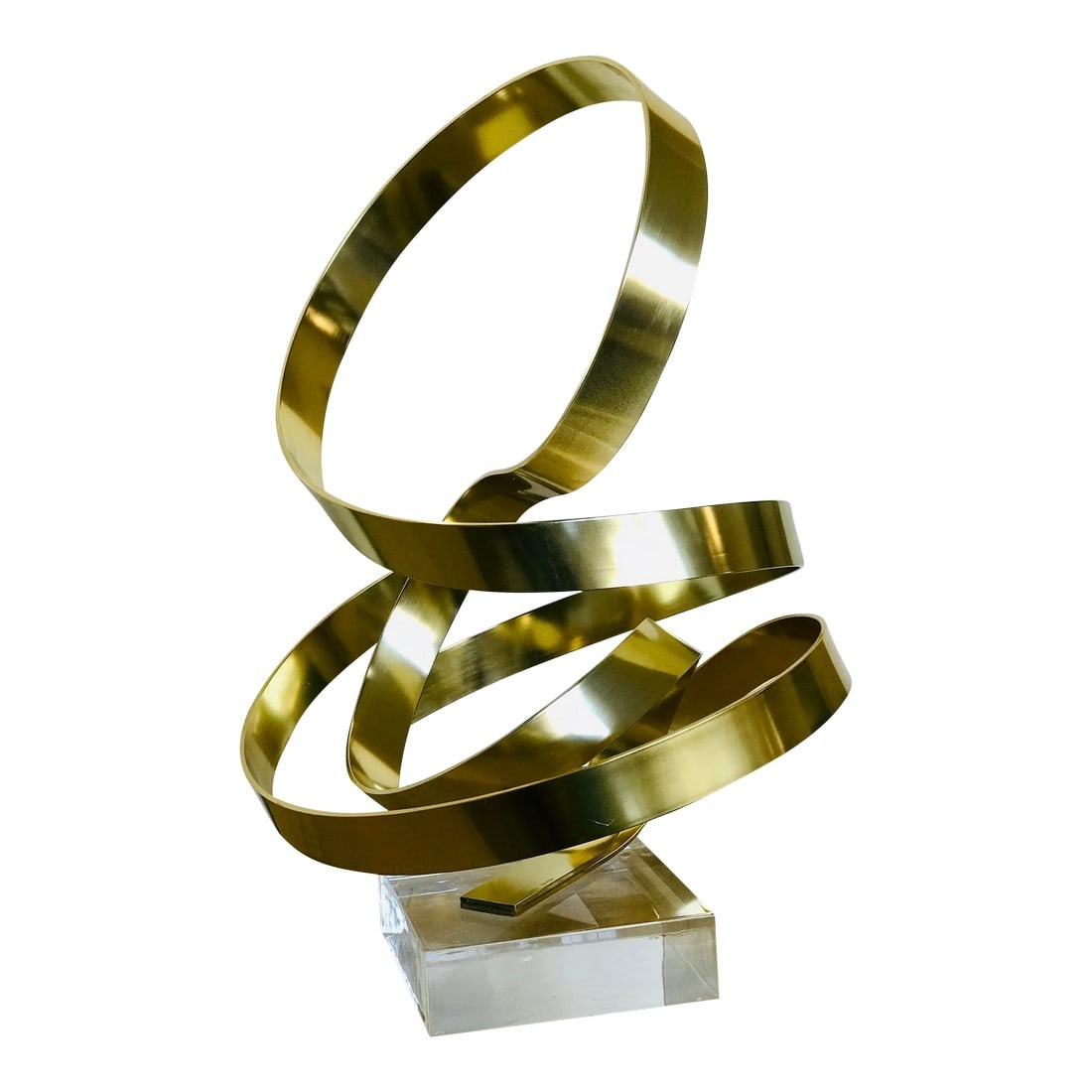 Dan Murphy (B.1942 Chicago) Gold Toned Ribbon Sculpture Dated 1986: A signed and dated sculpture by American artist Dan Murphy. Inscribed on lower section "Dan Murphy 1986". Gold tone metallic ribbons on lucite base. Condition: Alterations: Original Condition Unaltere