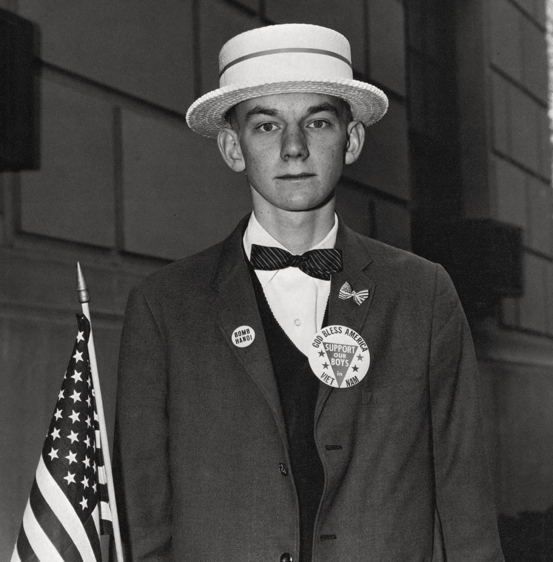 DIANE ARBUS - Boy with a Straw Hat waiting to march in a pro-war parade, NYC, 1967: Title: DIANE ARBUS - Boy with a Straw Hat waiting to march in a pro-war parade, NYC, 1967 Description: Artist: DIANE ARBUS Print Title: Boy with a Straw Hat waiting to march in a pro-war parade, NYC,